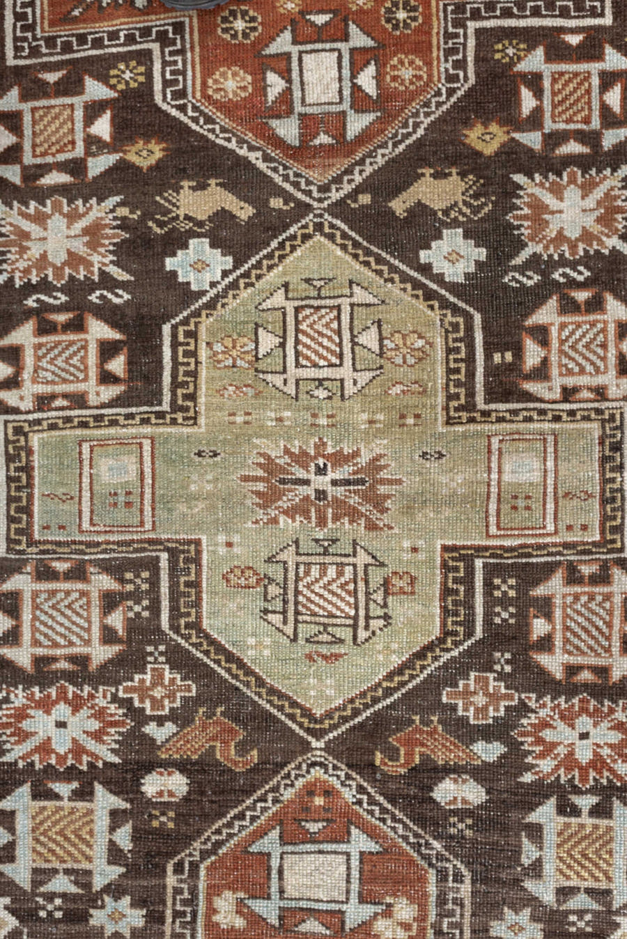 3' x 5' one-of-a-kind handmade antique Shirvan small size rug. Color palette: ivory, dark brown, rust, pale sage, sky blue