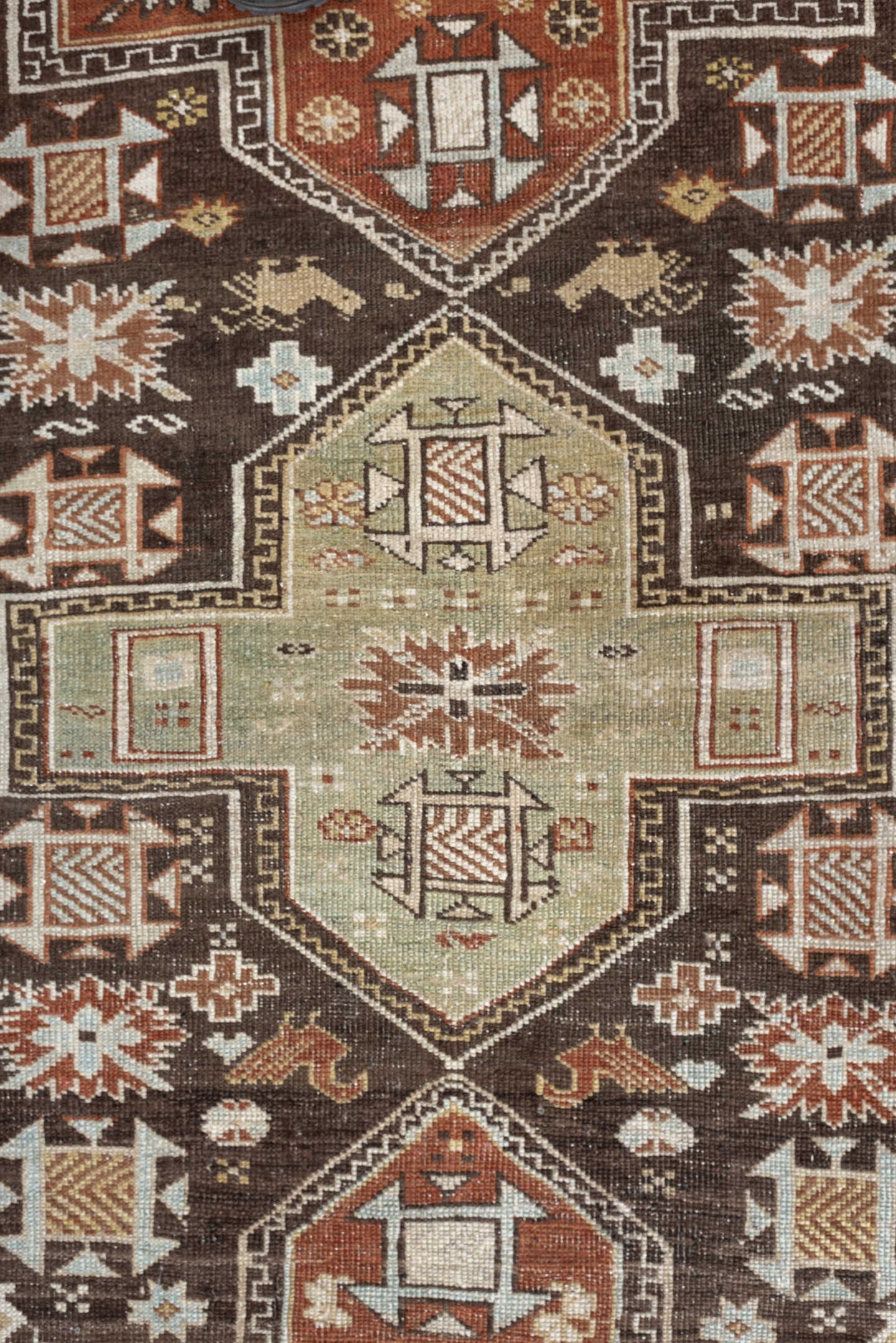 3' x 5' one-of-a-kind handmade antique Shirvan small size rug. Color palette: ivory, dark brown, rust, pale sage, sky blue
