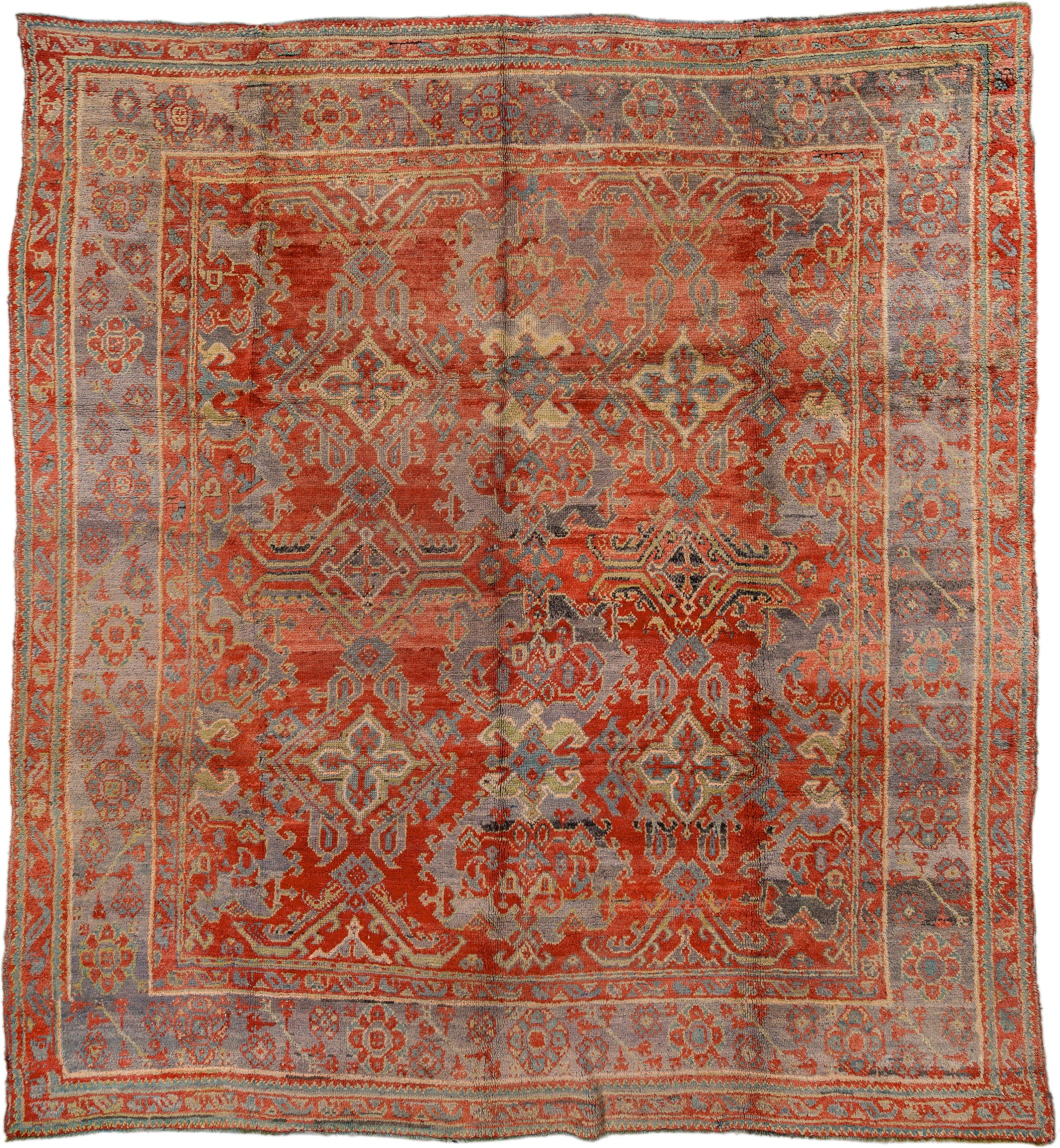 10' x 11' one-of-a-kind handmade antique Oushak large size rug. Color palette: terra cotta, gray, pale blue, ivory, rust