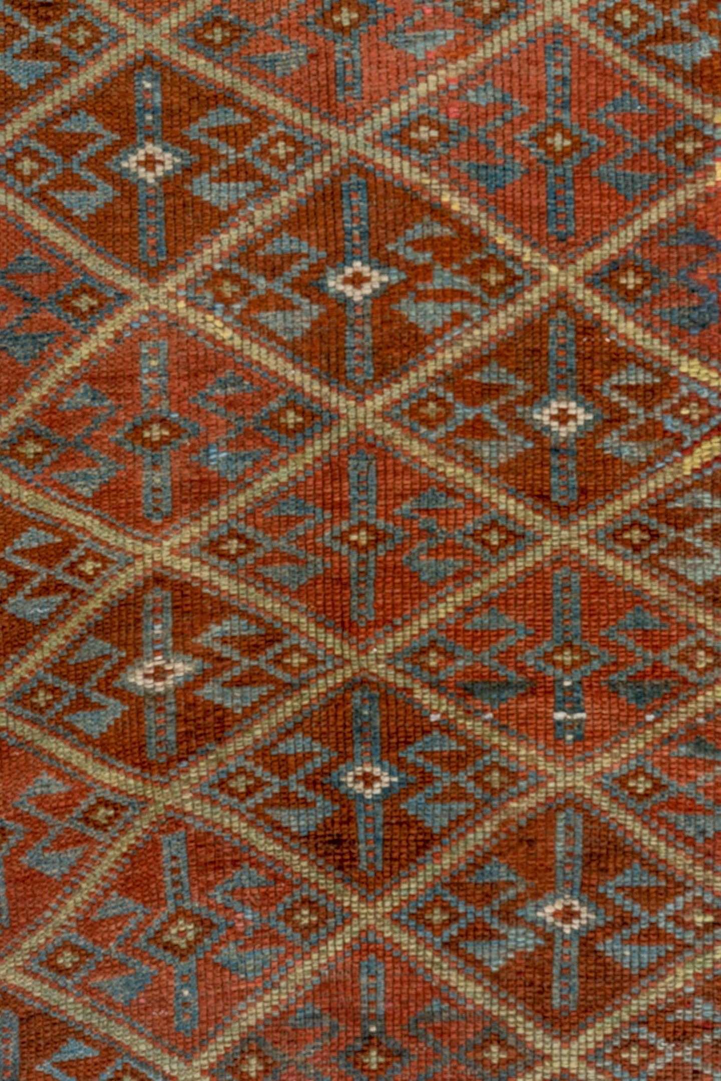 4' x 8' one-of-a-kind handmade antique Kurd rug. Color palette: rust, camel, ivory, sky blue, brown, taupe, gold, terracotta
