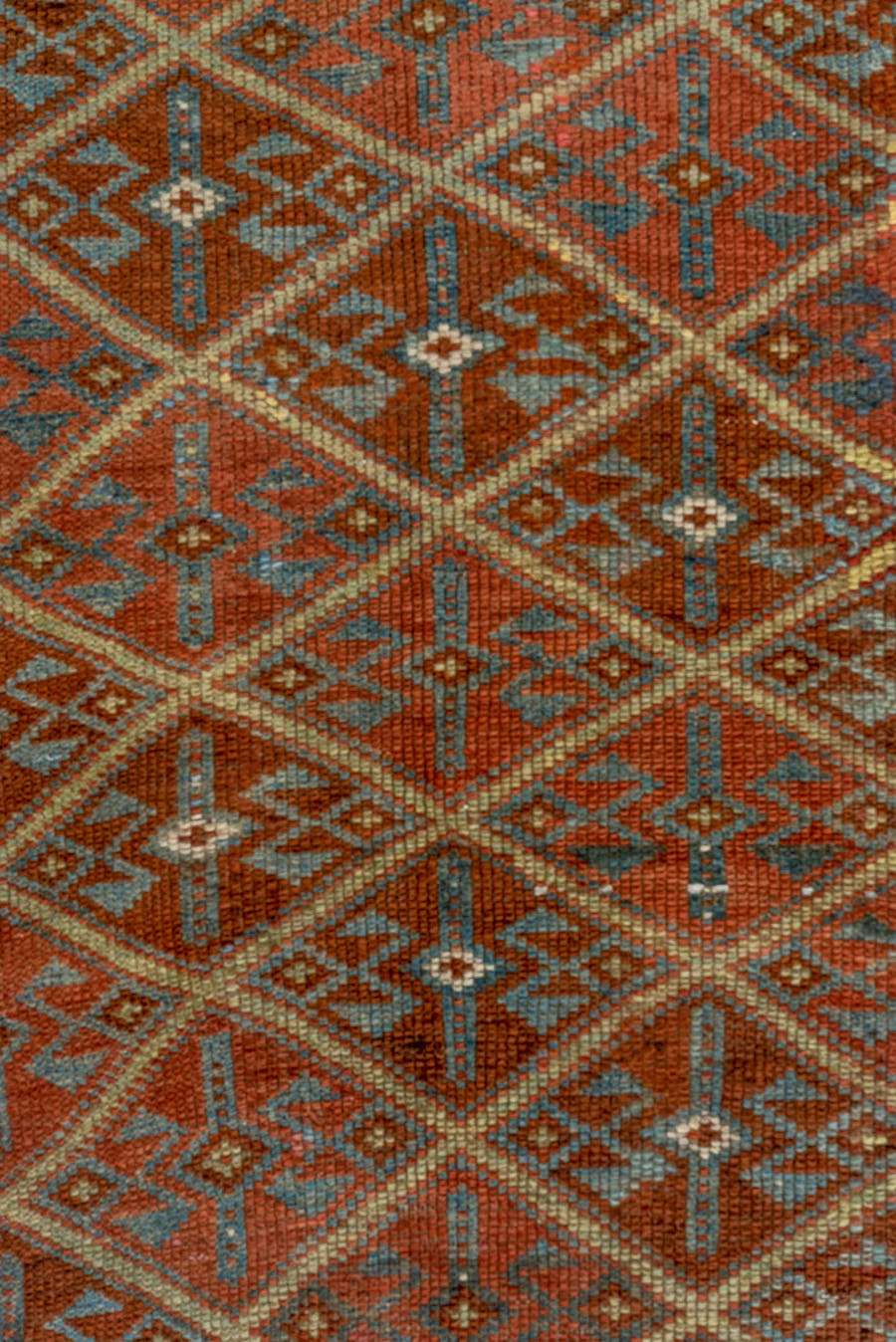 4' x 8' one-of-a-kind handmade antique Kurd rug. Color palette: rust, camel, ivory, sky blue, brown, taupe, gold, terracotta
