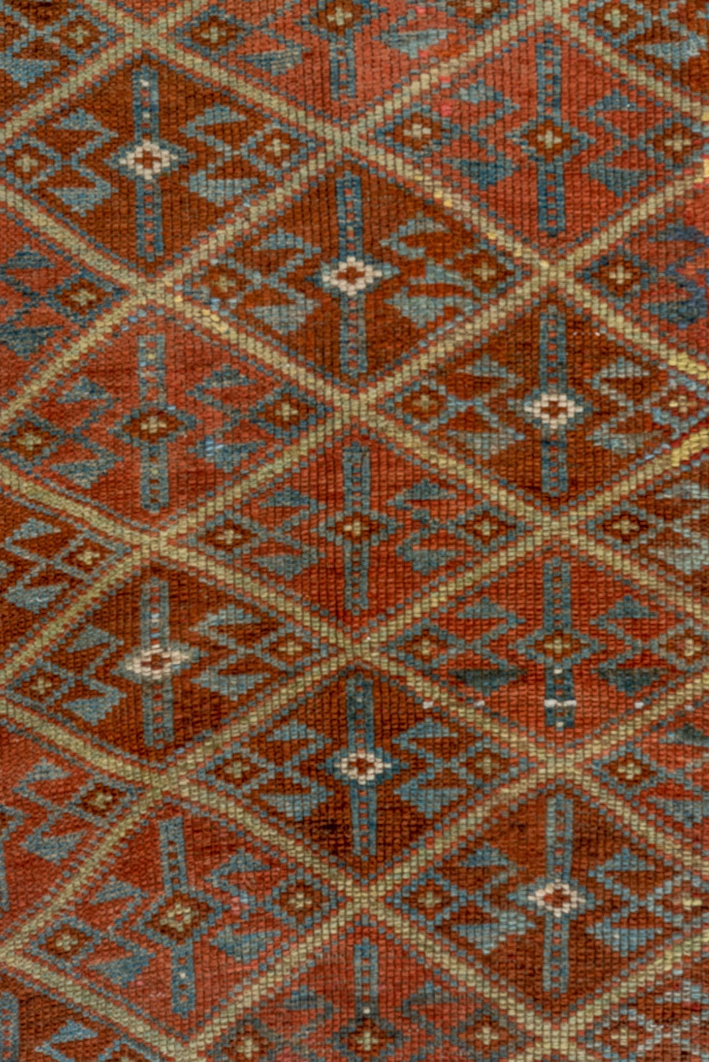 4' x 8' one-of-a-kind handmade antique Kurd rug. Color palette: rust, camel, ivory, sky blue, brown, taupe, gold, terracotta
