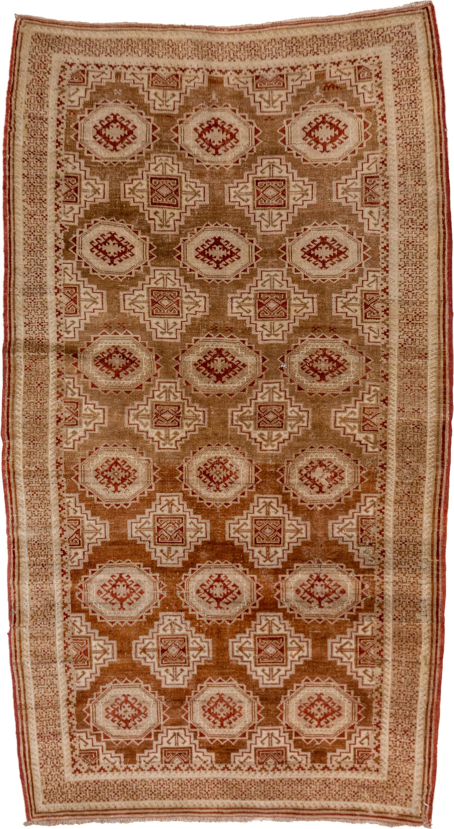 3' x 6' one-of-a-kind handmade antique Belouch rug. Color palette: camel, ivory, rust, terra cotta, tan, sienna, beige