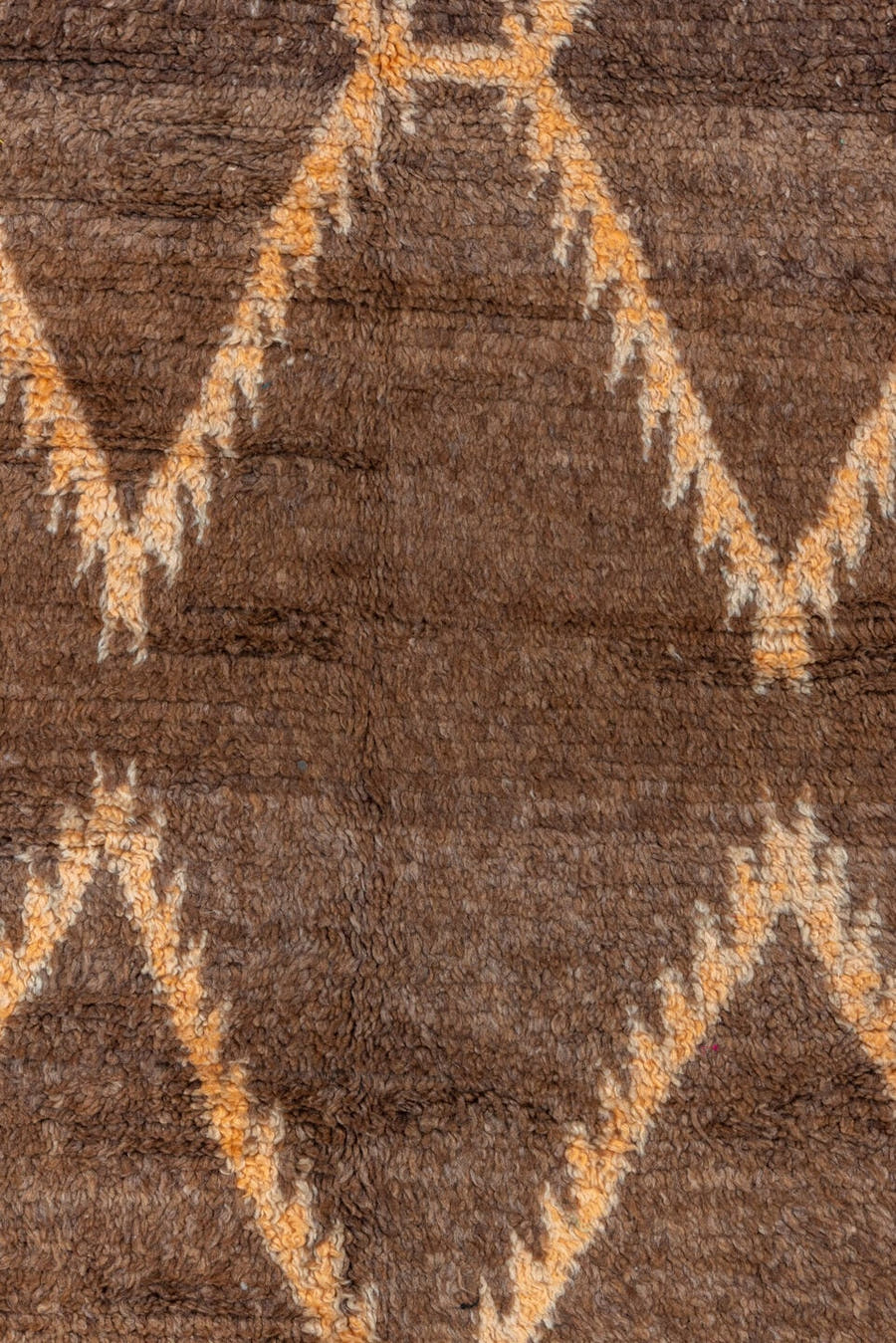 4' x 7' one-of-a-kind handmade vintage Moroccan rug. Color palette: brown, ivory, blush, taupe, charcoal, teal, purple, gold
