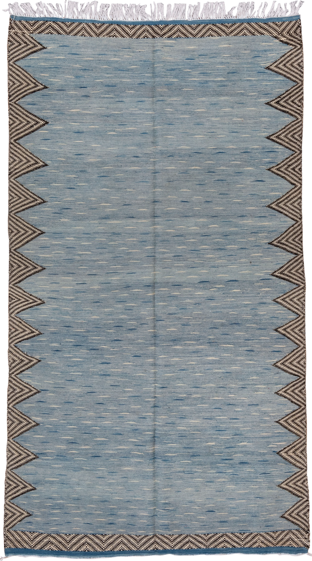 4' x 8' one-of-a-kind handmade vintage Kilim rug. Color palette: pale blue, ivory, charcoal, slate, light blue, gray, black