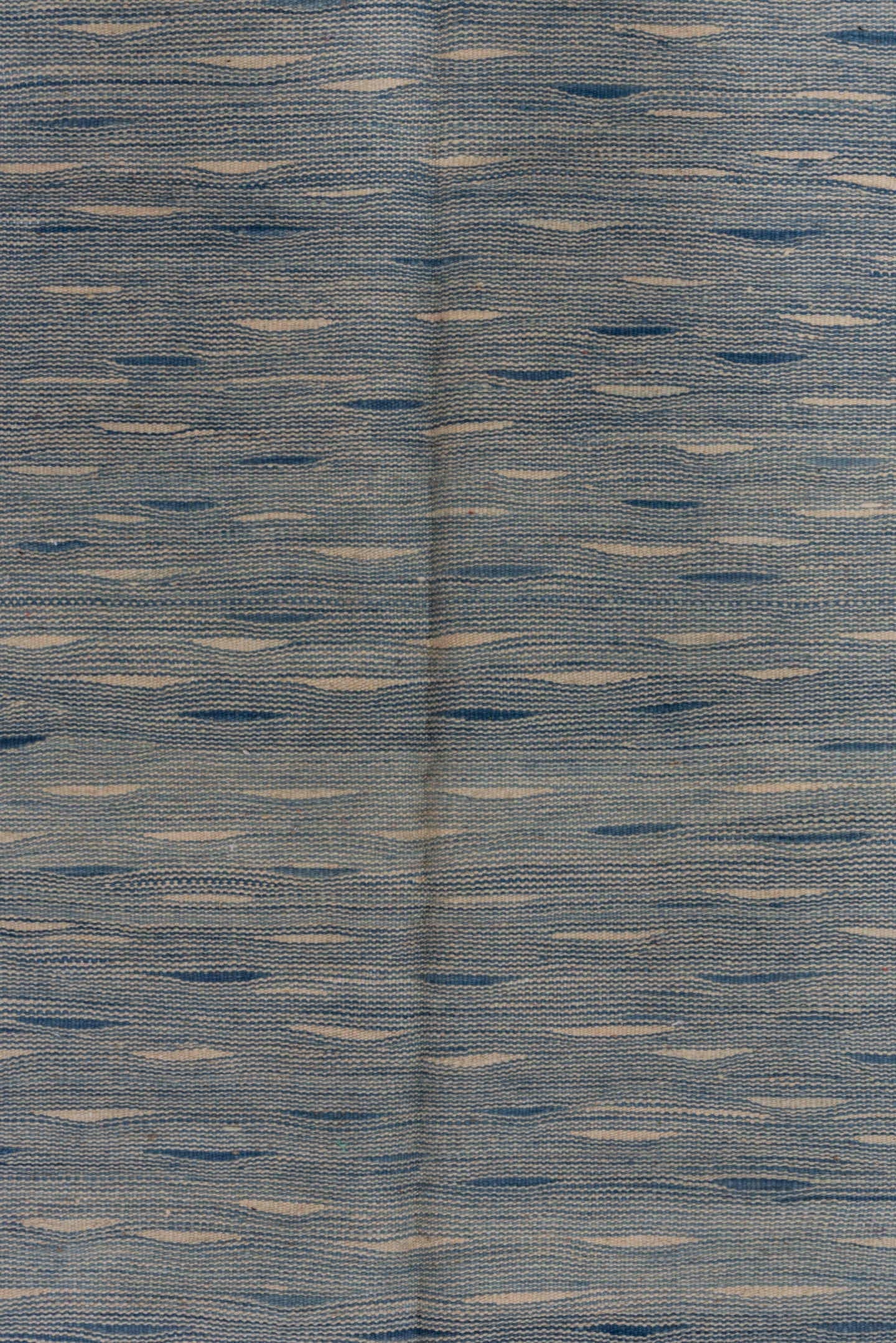 4' x 8' one-of-a-kind handmade vintage Kilim rug. Color palette: pale blue, ivory, charcoal, slate, light blue, gray, black