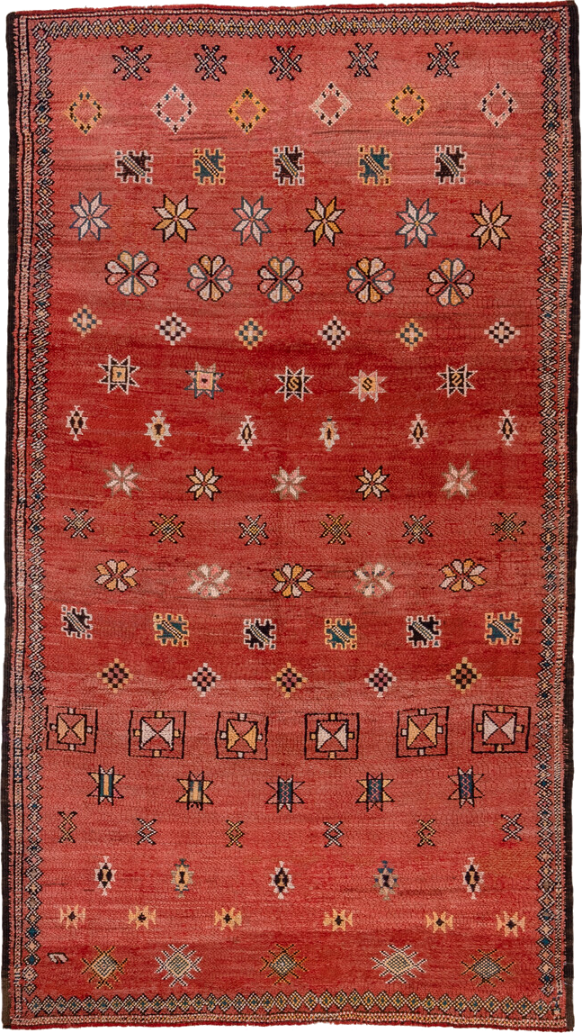 5' x 10' one-of-a-kind handmade vintage Moroccan medium size rug. Color palette: brown, gray, pink, red