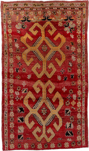 5' x 9' one-of-a-kind handmade antique Moroccan medium size rug. Color palette: red, gold, ivory, black, rose, rust, camel