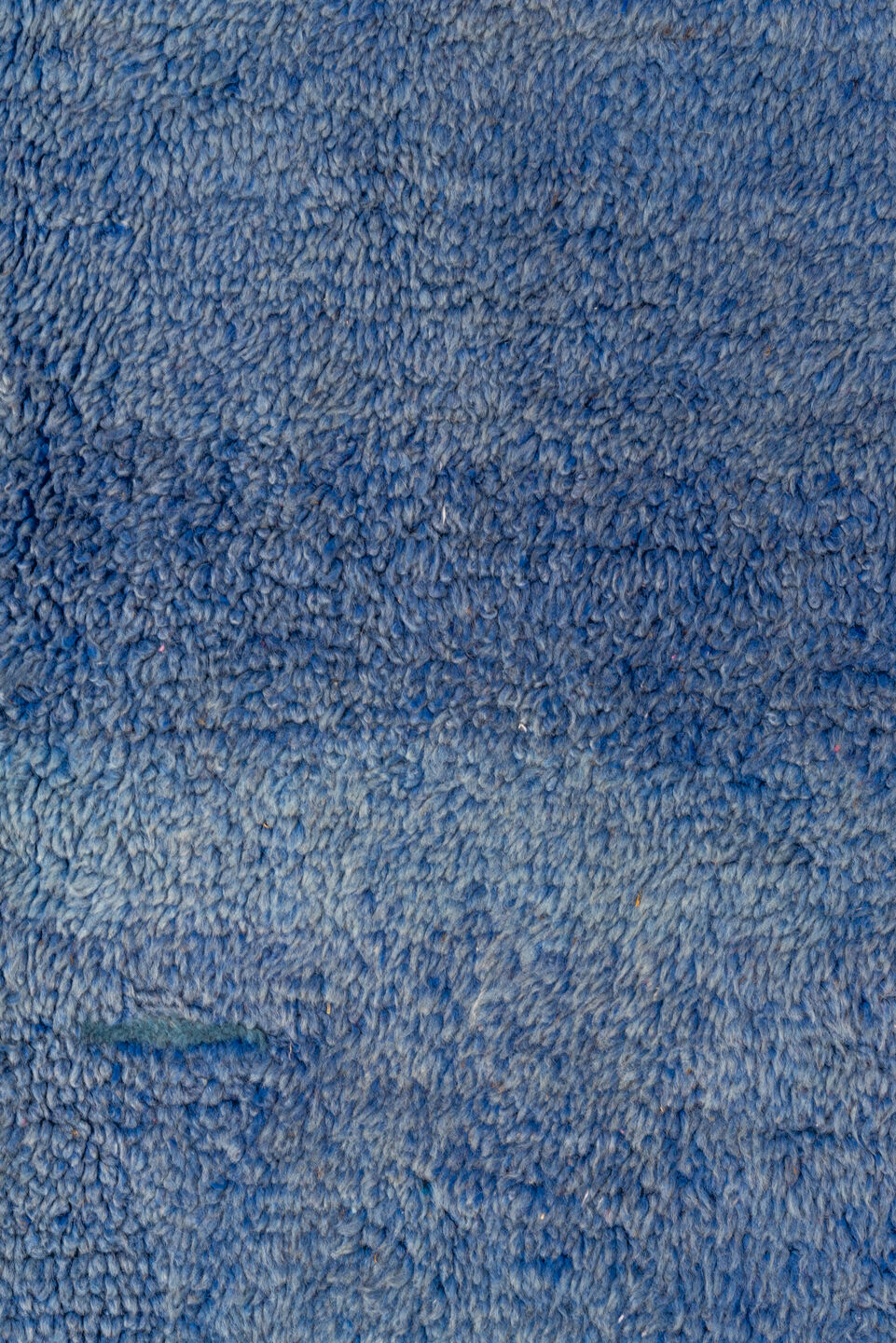 7' x 9' one-of-a-kind handmade antique Moroccan rug. Color palette: blue, cobalt, indigo, purple