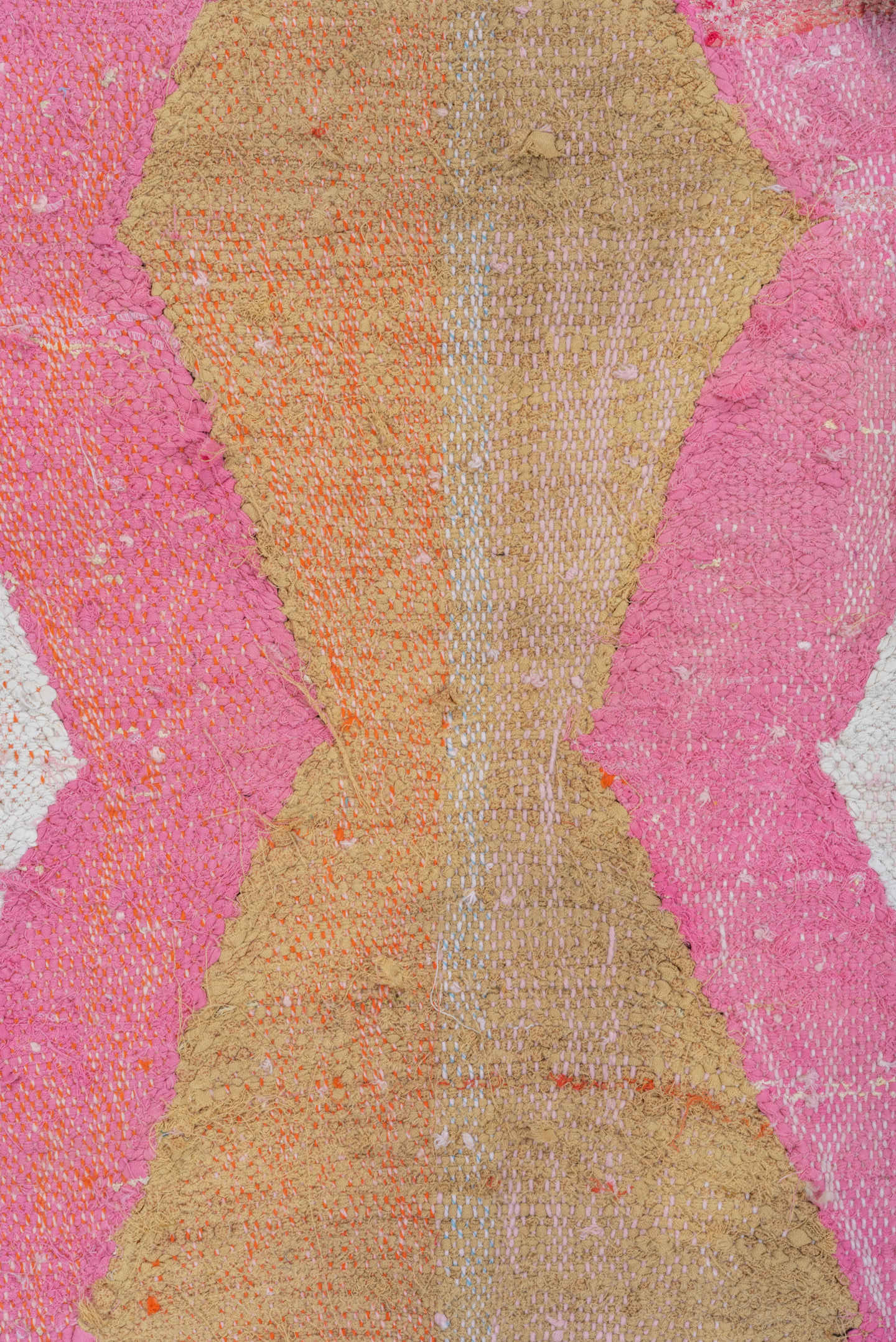 4' x 8' one-of-a-kind handmade vintage Rag Rug rug. Color palette: ivory, pink, tan, charcoal, sky_blue, taupe, orange