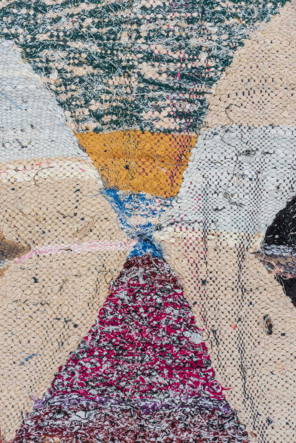 4' x 8' one-of-a-kind handmade vintage Rag Rug runner rug. Color palette: ivory, black, sky_blue, pink, yellow, rust, brown