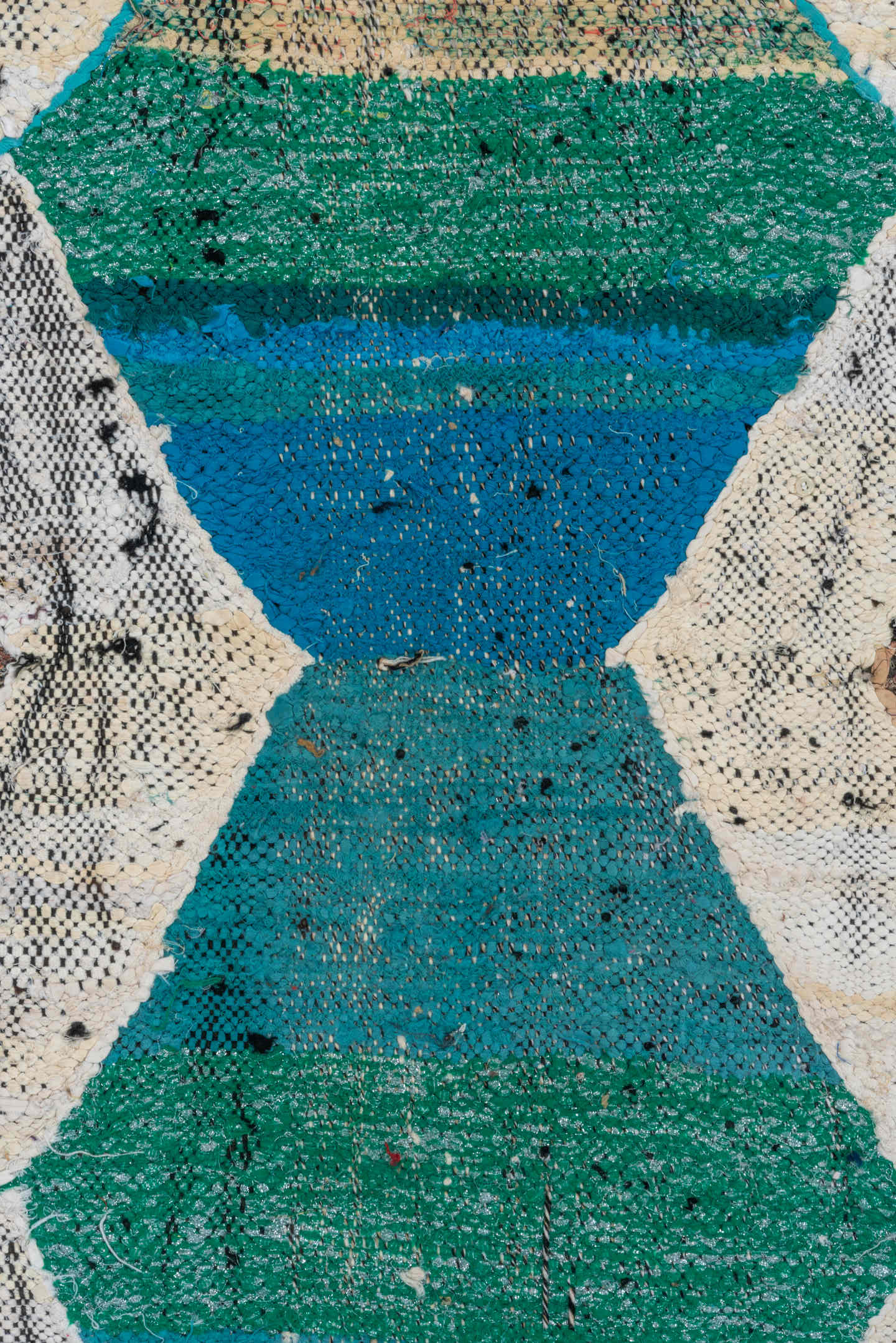 4' x 6' one-of-a-kind handmade vintage Rag Rug small size rug. Color palette: ivory, camel, teal, plum, charcoal, red, taupe