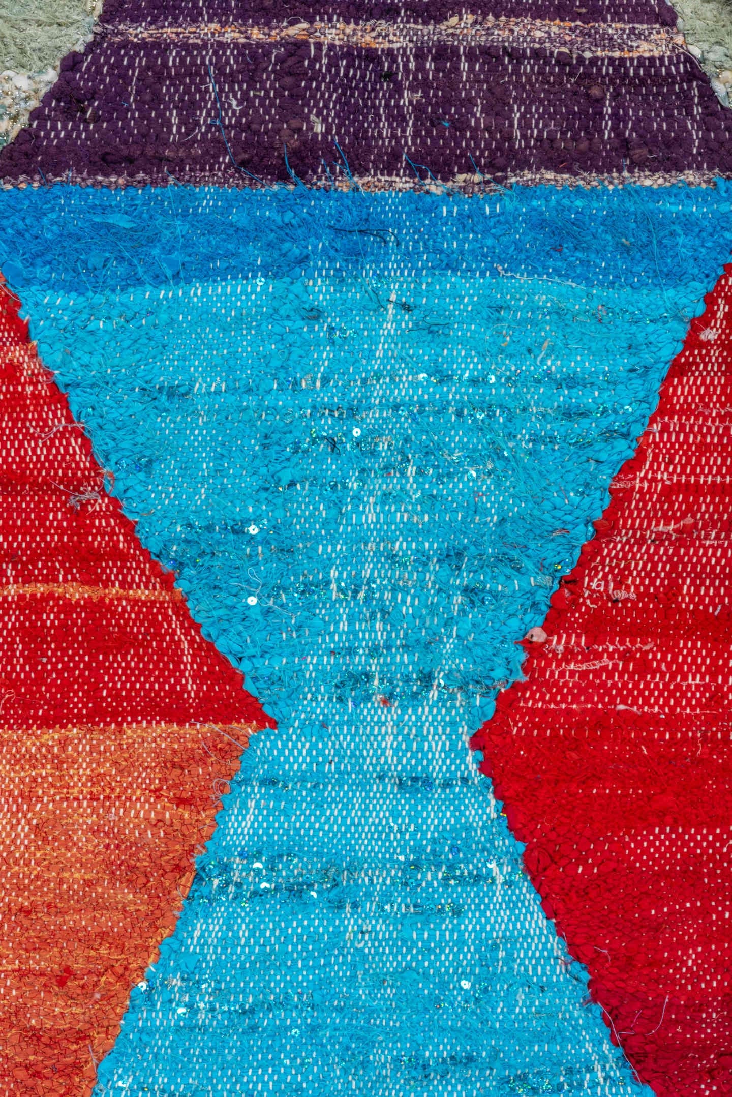 4' x 8' one-of-a-kind handmade vintage Rag Rug rug. Color palette: ivory, turquoise, navy, coral, plum, pink, orange, gray