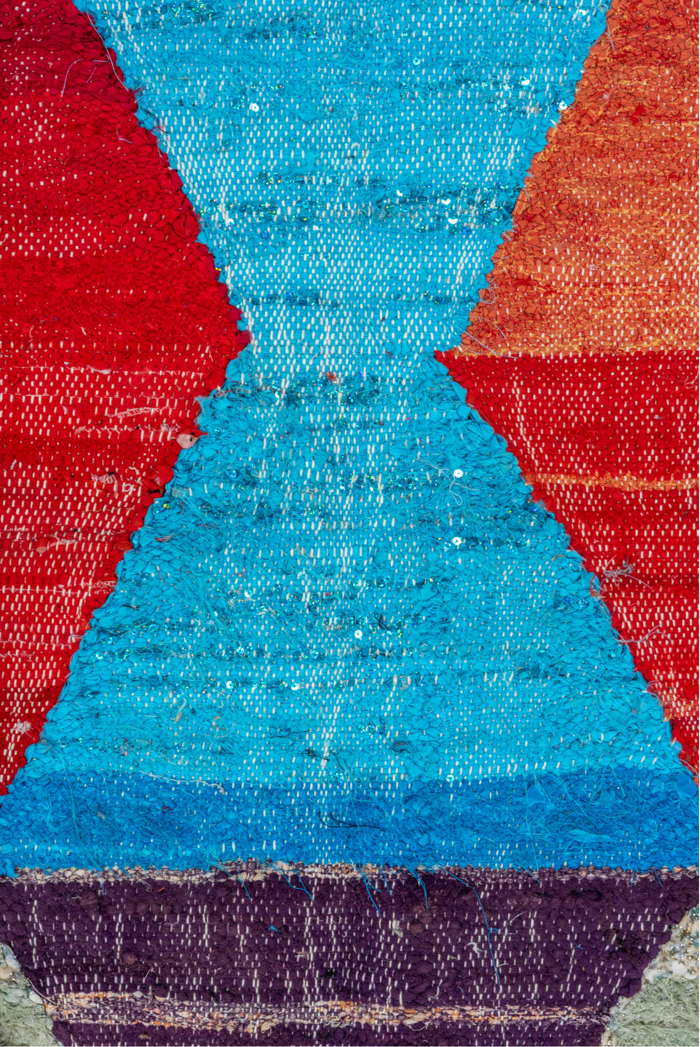 4' x 8' one-of-a-kind handmade vintage Rag Rug rug. Color palette: ivory, turquoise, navy, coral, plum, pink, orange, gray