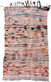 4' x 7' one-of-a-kind handmade vintage Rag Rug rug. Color palette: ivory, blush, charcoal, coral, indigo, saffron, taupe