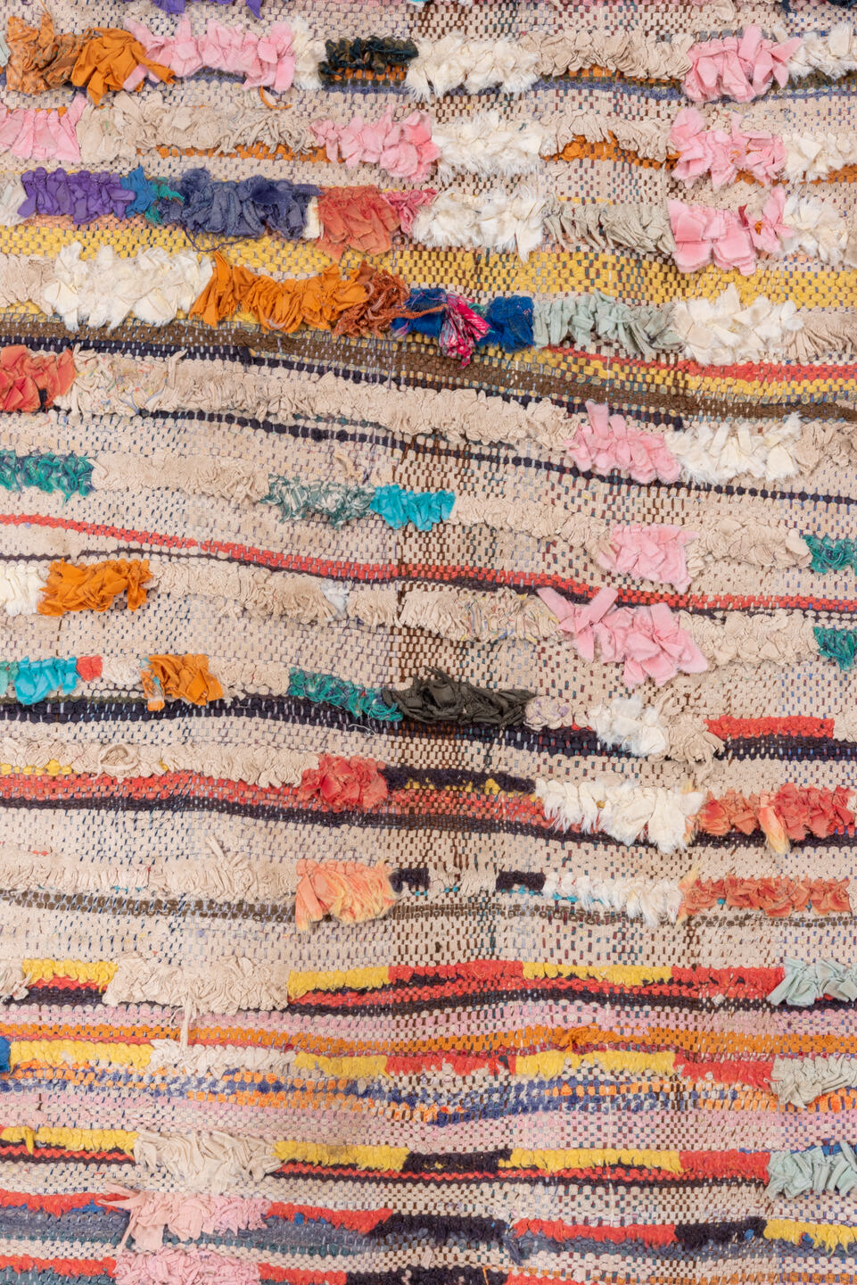 4' x 7' one-of-a-kind handmade vintage Rag Rug rug. Color palette: ivory, blush, charcoal, coral, indigo, saffron, taupe