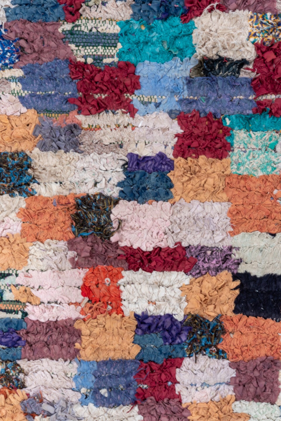 3' x 7' one-of-a-kind handmade vintage Rag Rug runner rug. Color palette: ivory, blush, denim, crimson, lavender, sky_blue