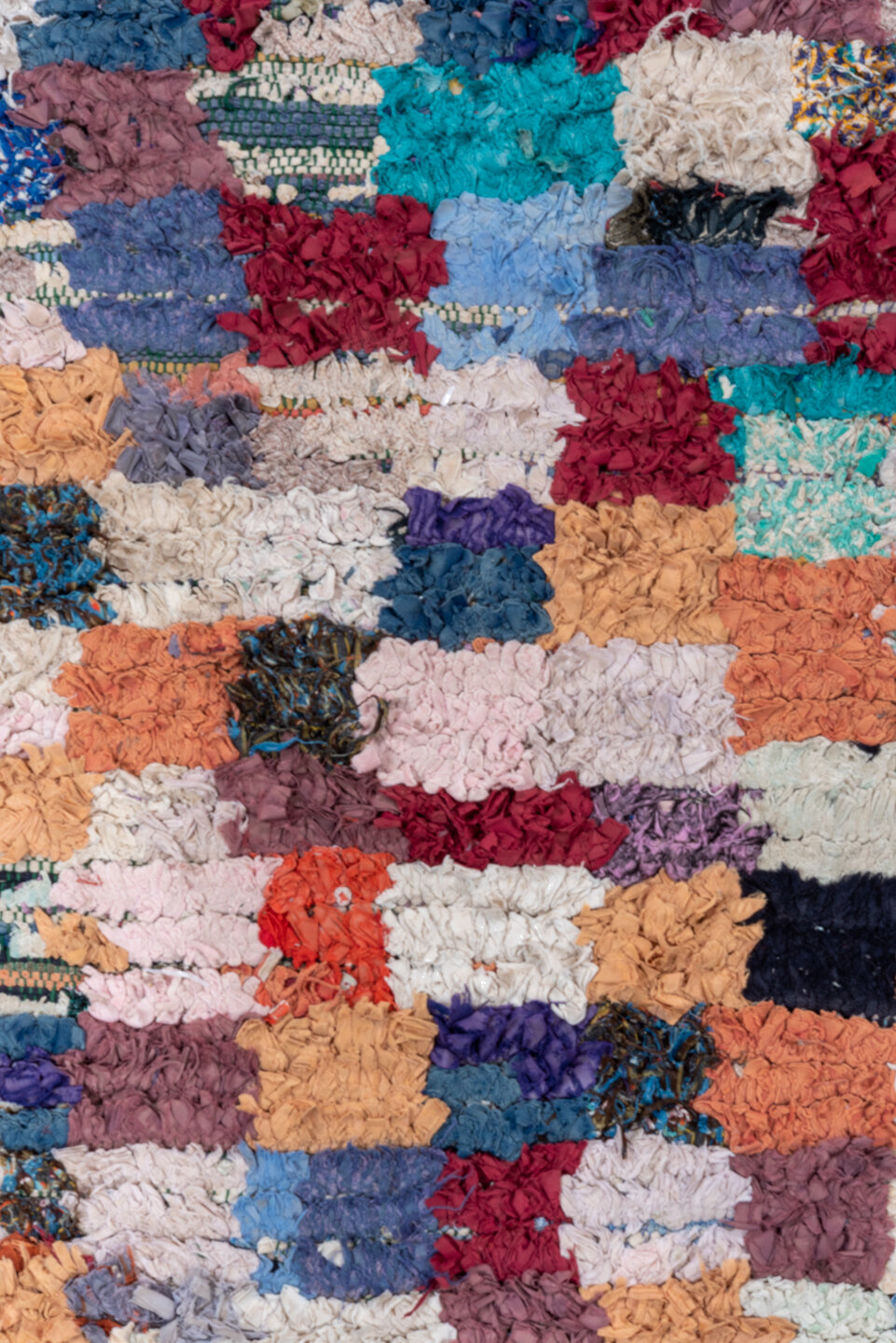 3' x 7' one-of-a-kind handmade vintage Rag Rug runner rug. Color palette: black, blue, brown, gray, green, light blue
