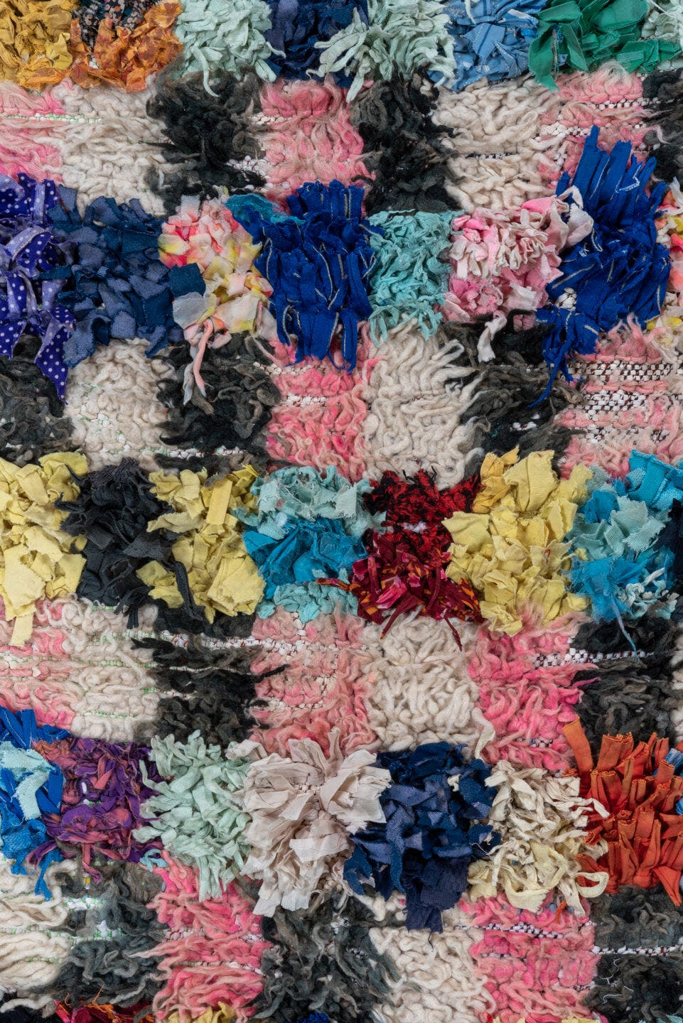 3' x 5' one-of-a-kind handmade vintage Rag Rug small size rug. Color palette: ivory, blush, cobalt, charcoal, crimson