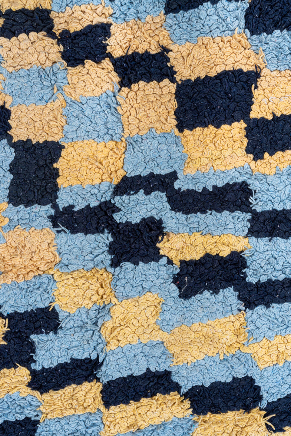 3' x 6' one-of-a-kind handmade vintage Rag Rug runner rug. Color palette: light blue, cream, navy, teal, rust, black, ivory