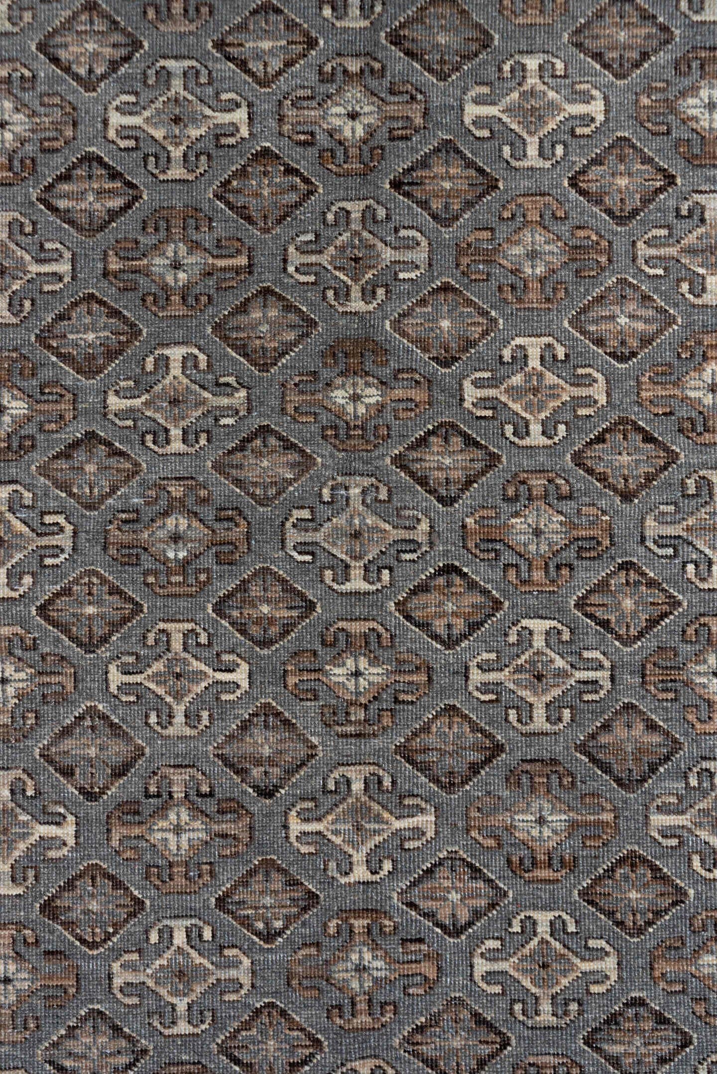 4' x 6' one-of-a-kind handmade vintage Khotan small size rug. Color palette: taupe, ivory, brown, charcoal, camel, greige