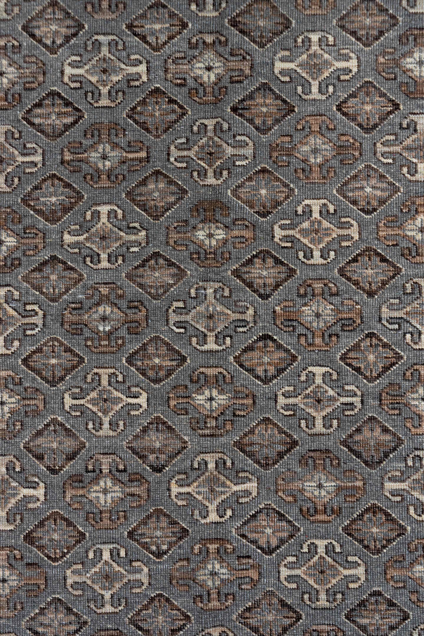 4' x 6' one-of-a-kind handmade vintage Khotan small size rug. Color palette: taupe, ivory, brown, charcoal, camel, greige