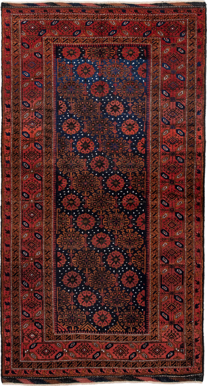 3' x 7' one-of-a-kind handmade antique Belouch rug. Color palette: rust, navy, terracotta, burgundy, camel, ivory, charcoal