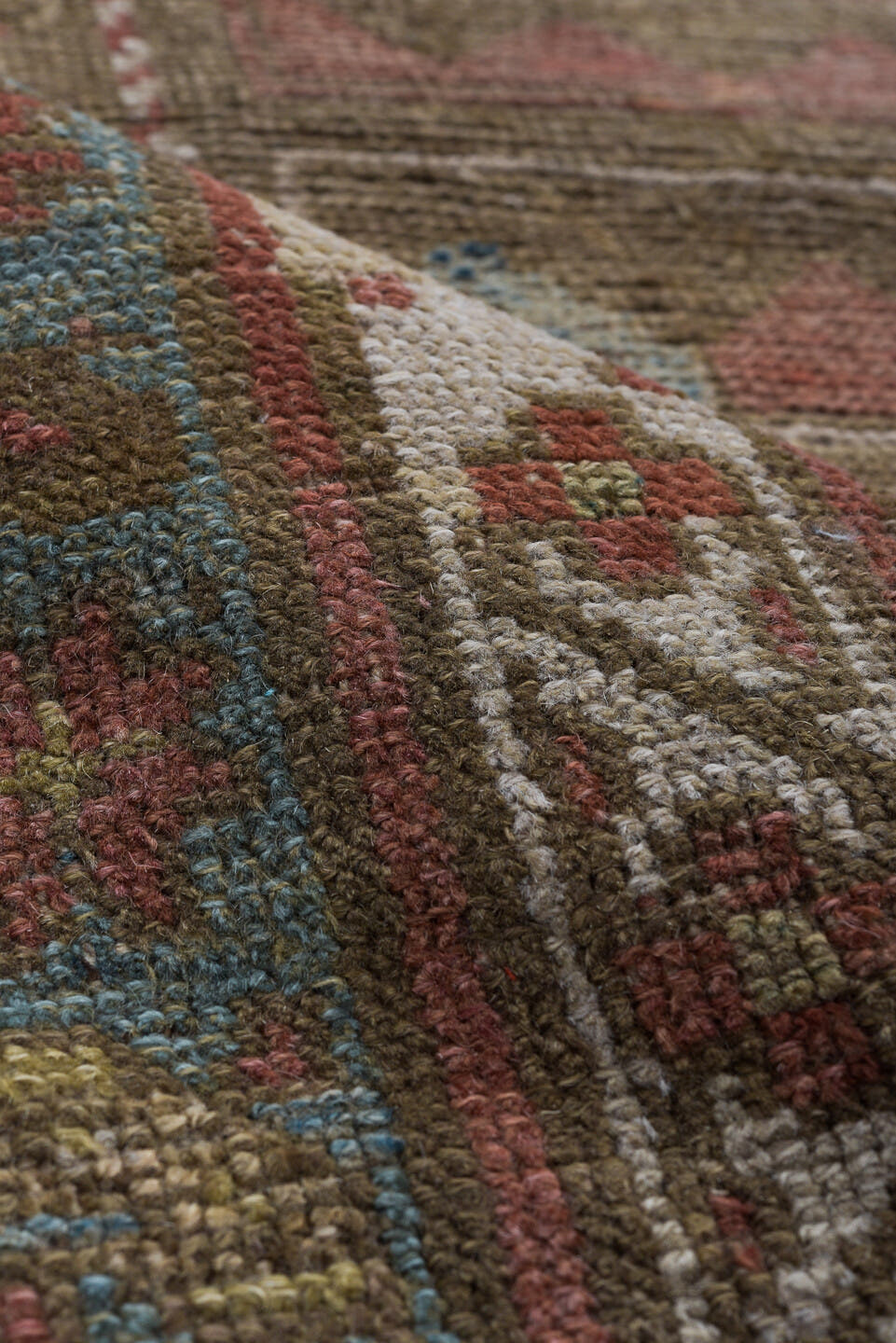 3' x 8' one-of-a-kind handmade vintage Caucasian runner rug. Color palette: taupe, rust, ivory, soft blue, brown, terracotta