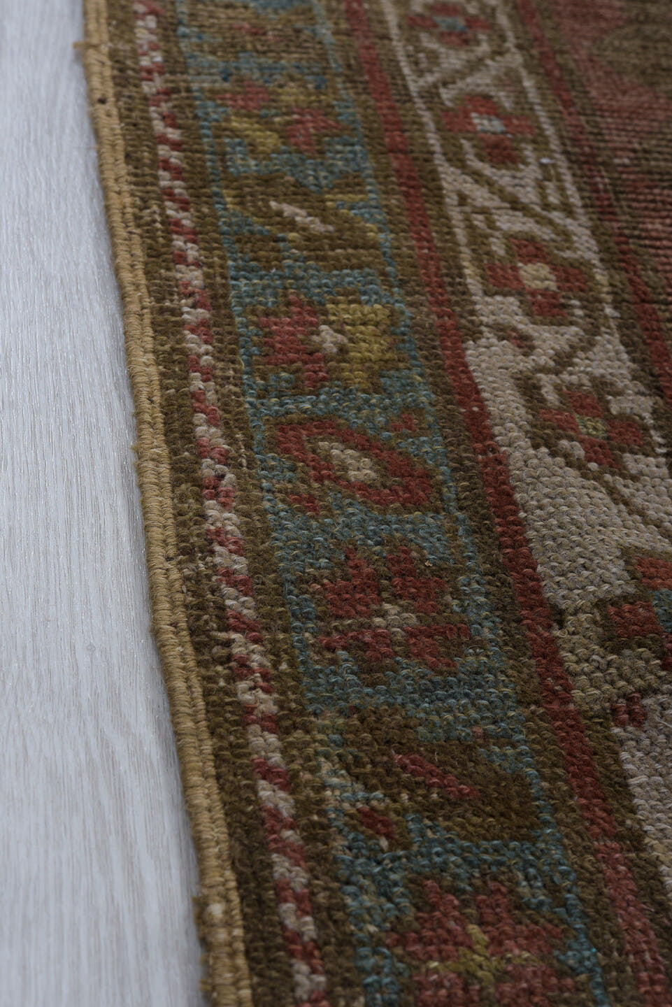 3' x 8' one-of-a-kind handmade vintage Caucasian runner rug. Color palette: taupe, rust, ivory, soft blue, brown, terracotta