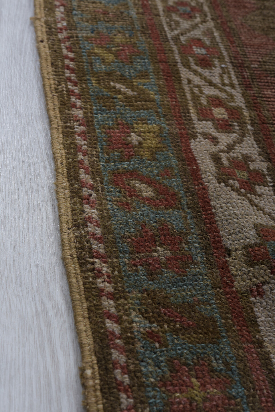 3' x 8' one-of-a-kind handmade vintage Caucasian runner rug. Color palette: taupe, rust, ivory, soft blue, brown, terracotta