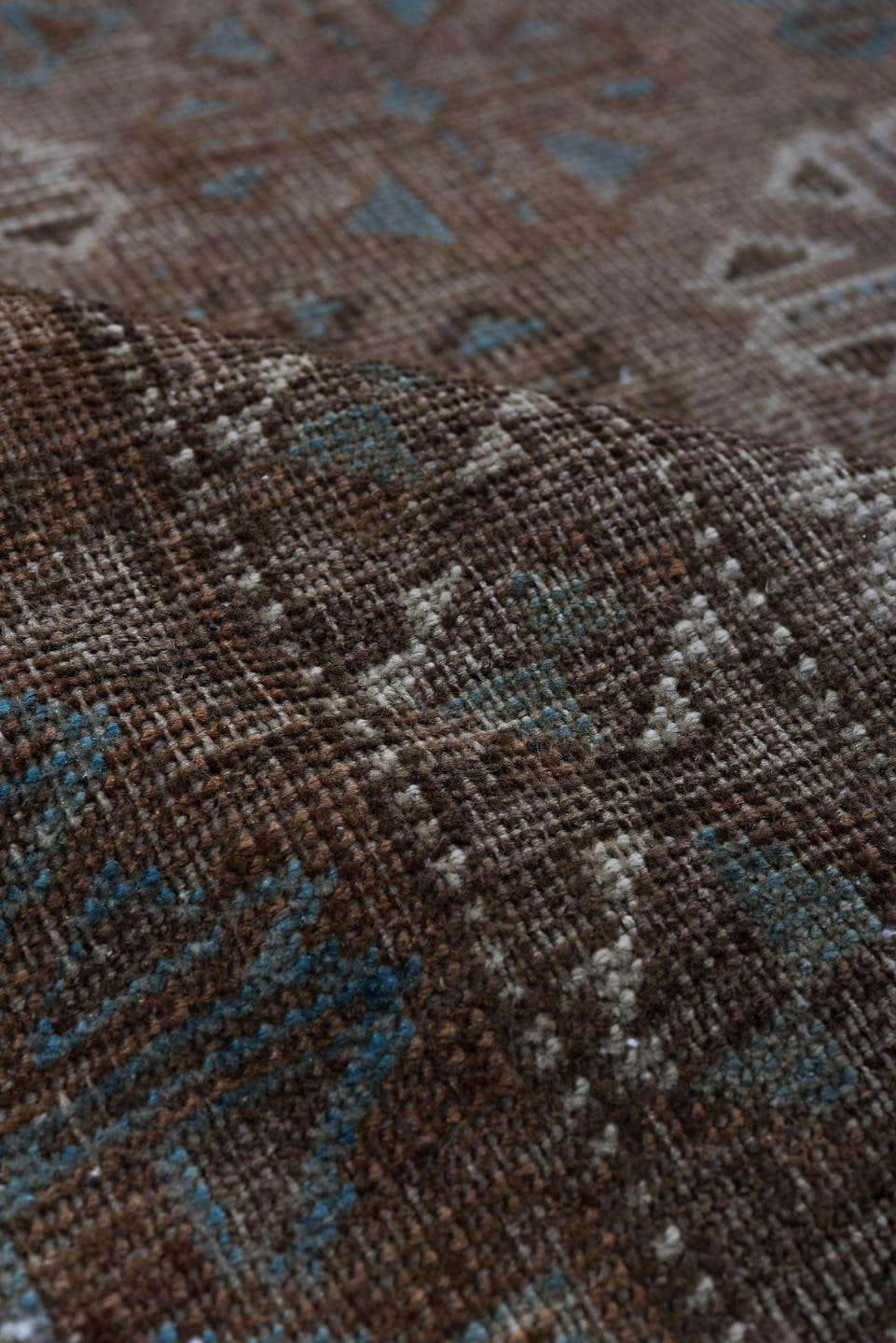 5' x 8' one-of-a-kind handmade vintage Belouch medium size rug. Color palette: brown, taupe, ivory, charcoal, slate, camel