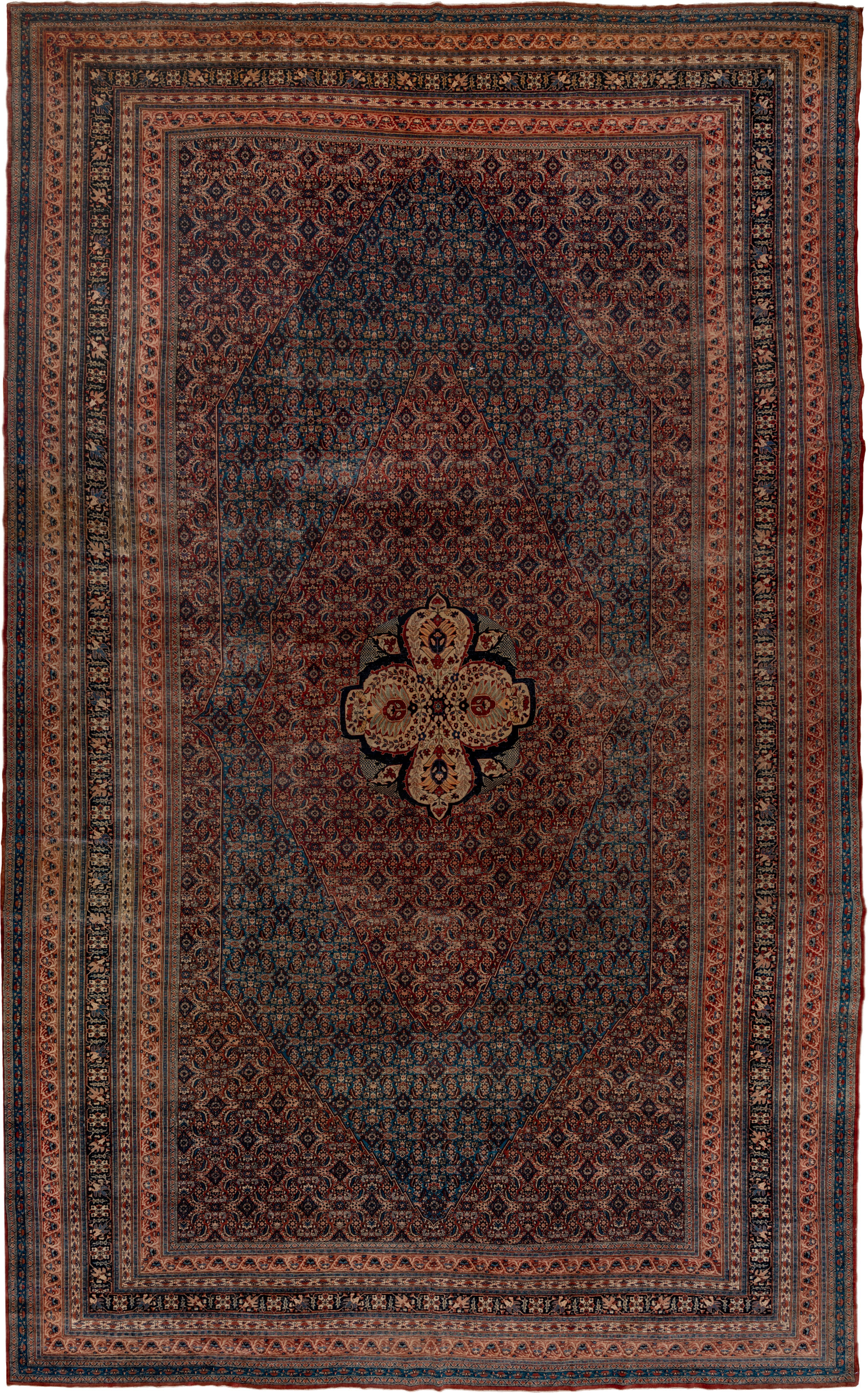12' x 19' one-of-a-kind handmade antique Tabriz oversize rug. Color palette: navy, rust, ivory, terra cotta, indigo, camel