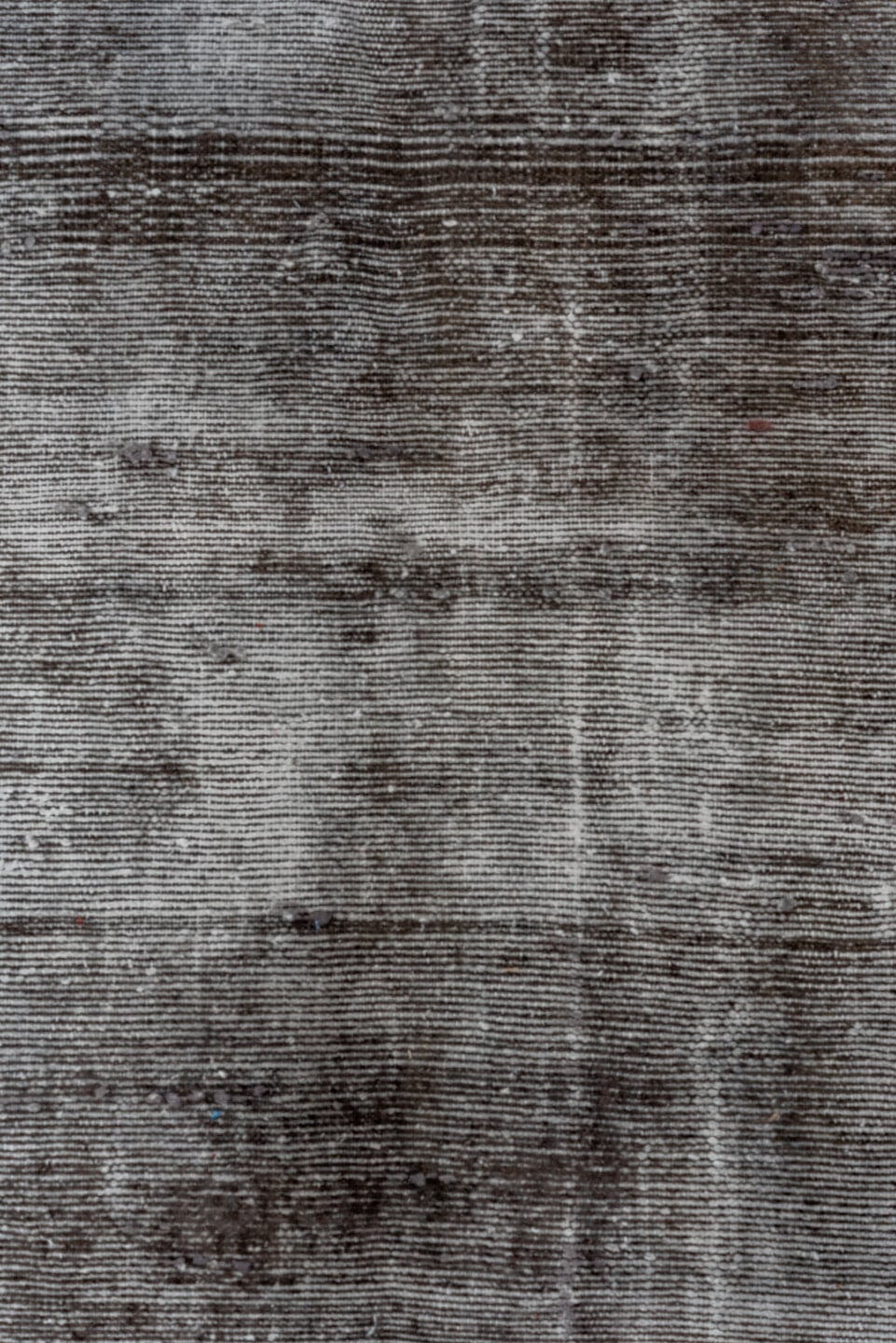 4' x 11' one-of-a-kind handmade vintage Distressed runner rug. Color palette: charcoal, silver, gray, taupe, black, beige