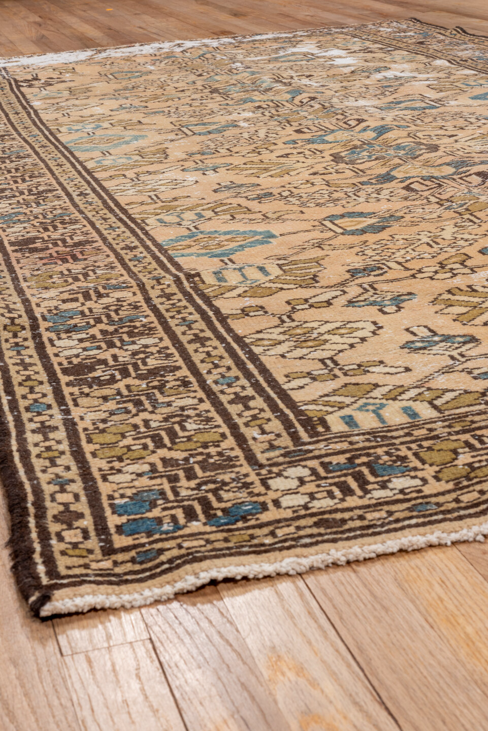5' x 9' one-of-a-kind handmade vintage Distressed medium size rug. Color palette: brown, gray, light gray, off-white