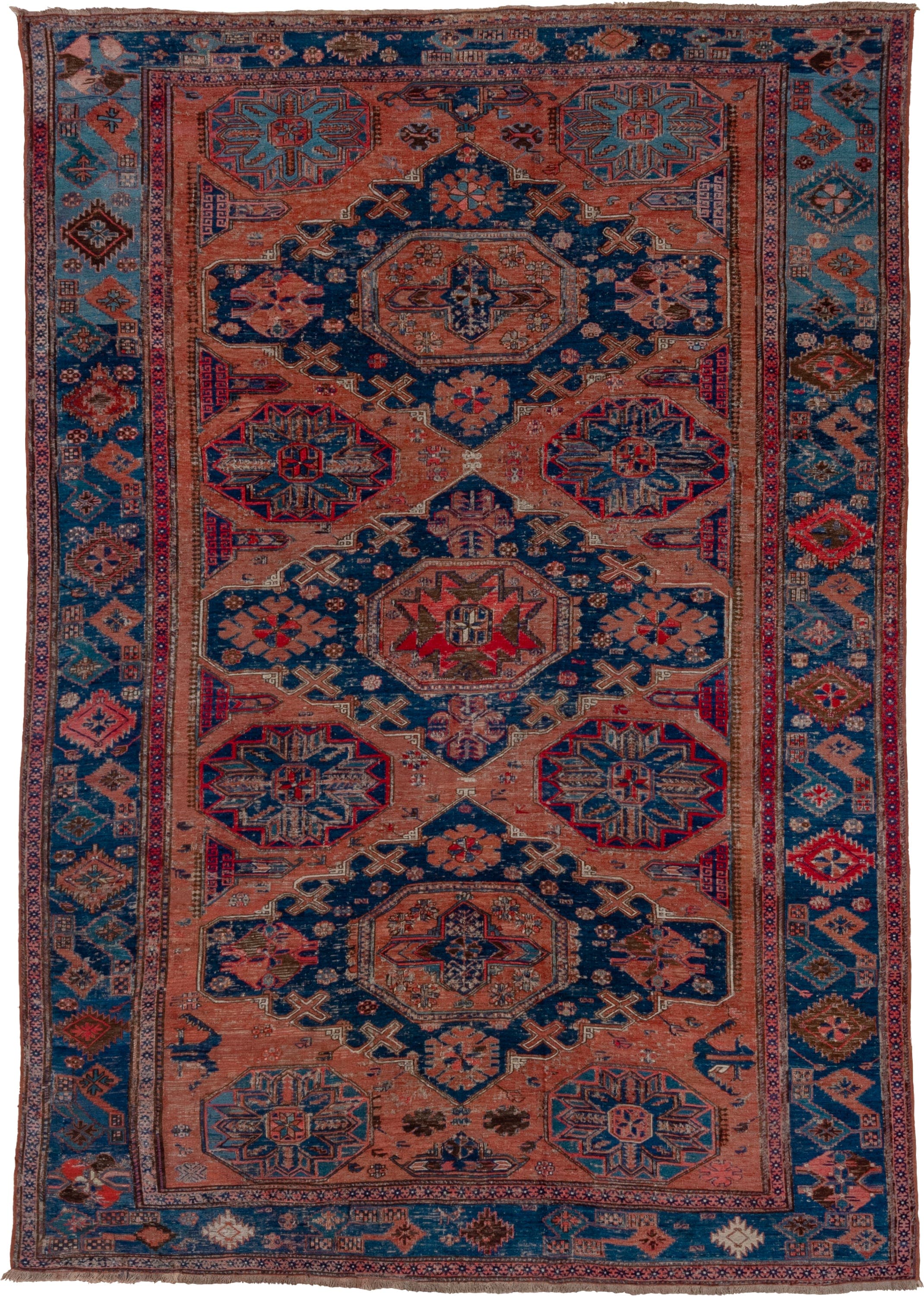 6' x 9' one-of-a-kind handmade antique Sumak medium size rug. Color palette: terra cotta, indigo, sky blue, rust, crimson