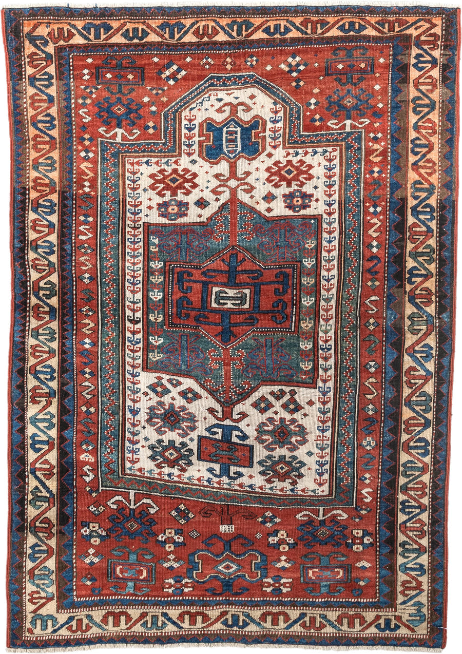3' x 5' one-of-a-kind handmade antique Kazak small size rug. Color palette: terracotta, ivory, indigo, rust, sky_blue, navy