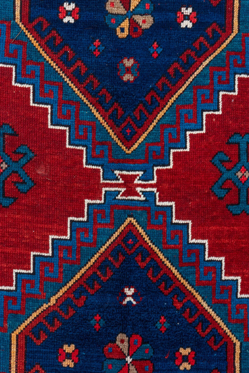 4' x 10' one-of-a-kind handmade antique Kazak runner rug. Color palette: red, navy, sky blue, ivory, crimson, charcoal, rose
