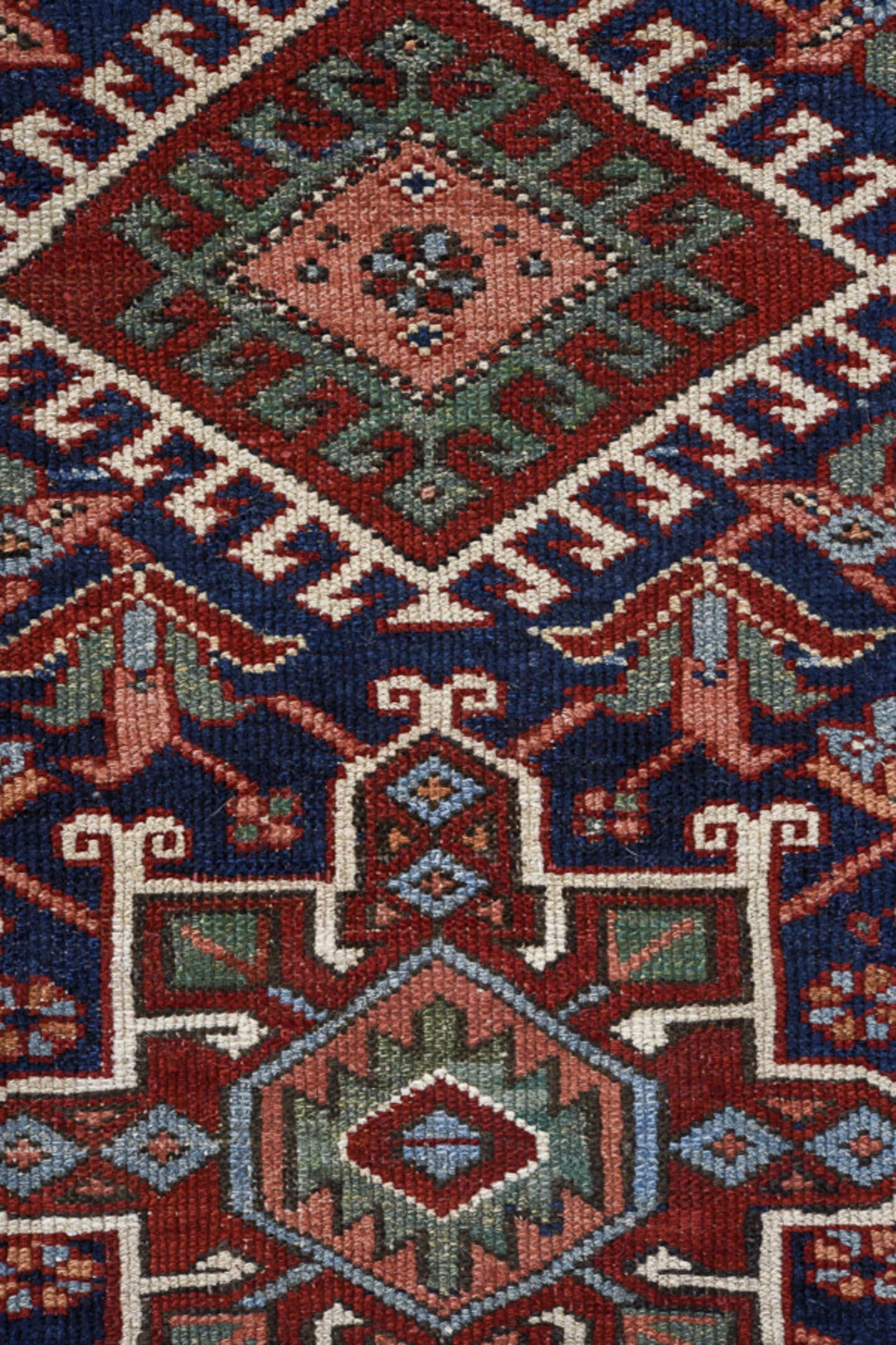 3' x 8' one-of-a-kind handmade antique Karaje runner rug. Color palette: navy, rust, sky blue, ivory, terracotta, sage