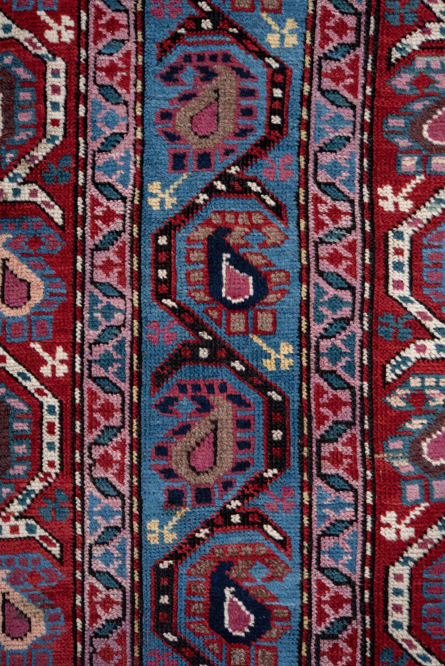 3' x 11' one-of-a-kind handmade antique Caucasian runner rug. Color palette: blue, red, ivory, navy, sky_blue, burgundy