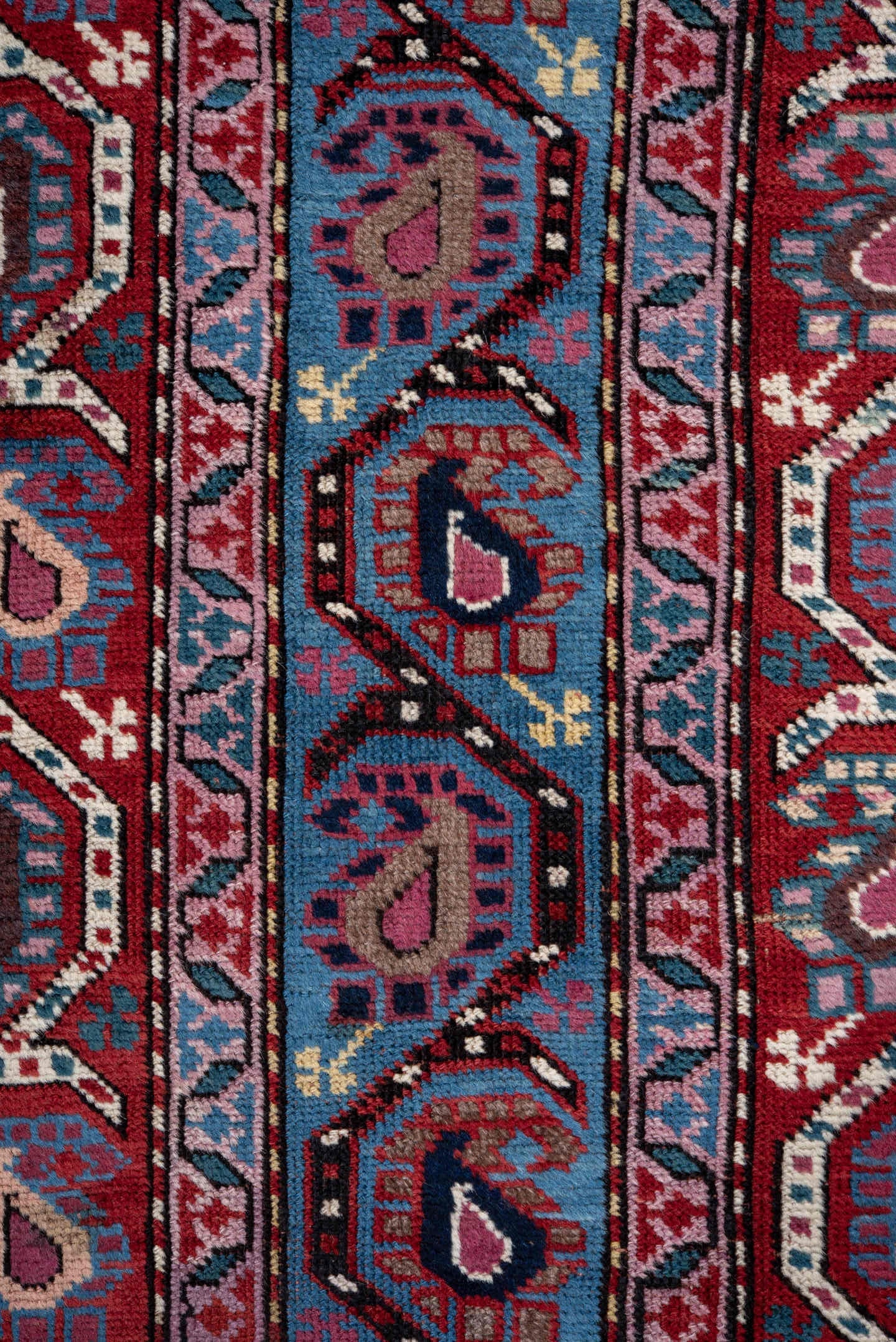 3' x 11' one-of-a-kind handmade antique Caucasian runner rug. Color palette: blue, red, ivory, navy, sky_blue, burgundy