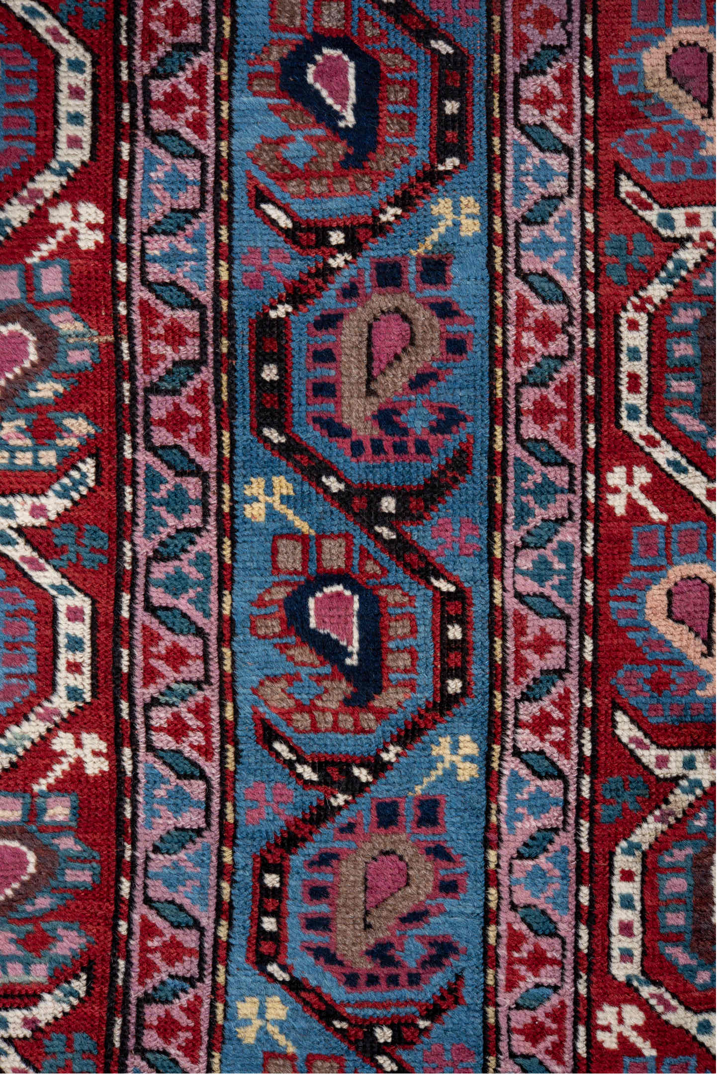 3' x 11' one-of-a-kind handmade antique Caucasian runner rug. Color palette: blue, red, ivory, navy, sky_blue, burgundy