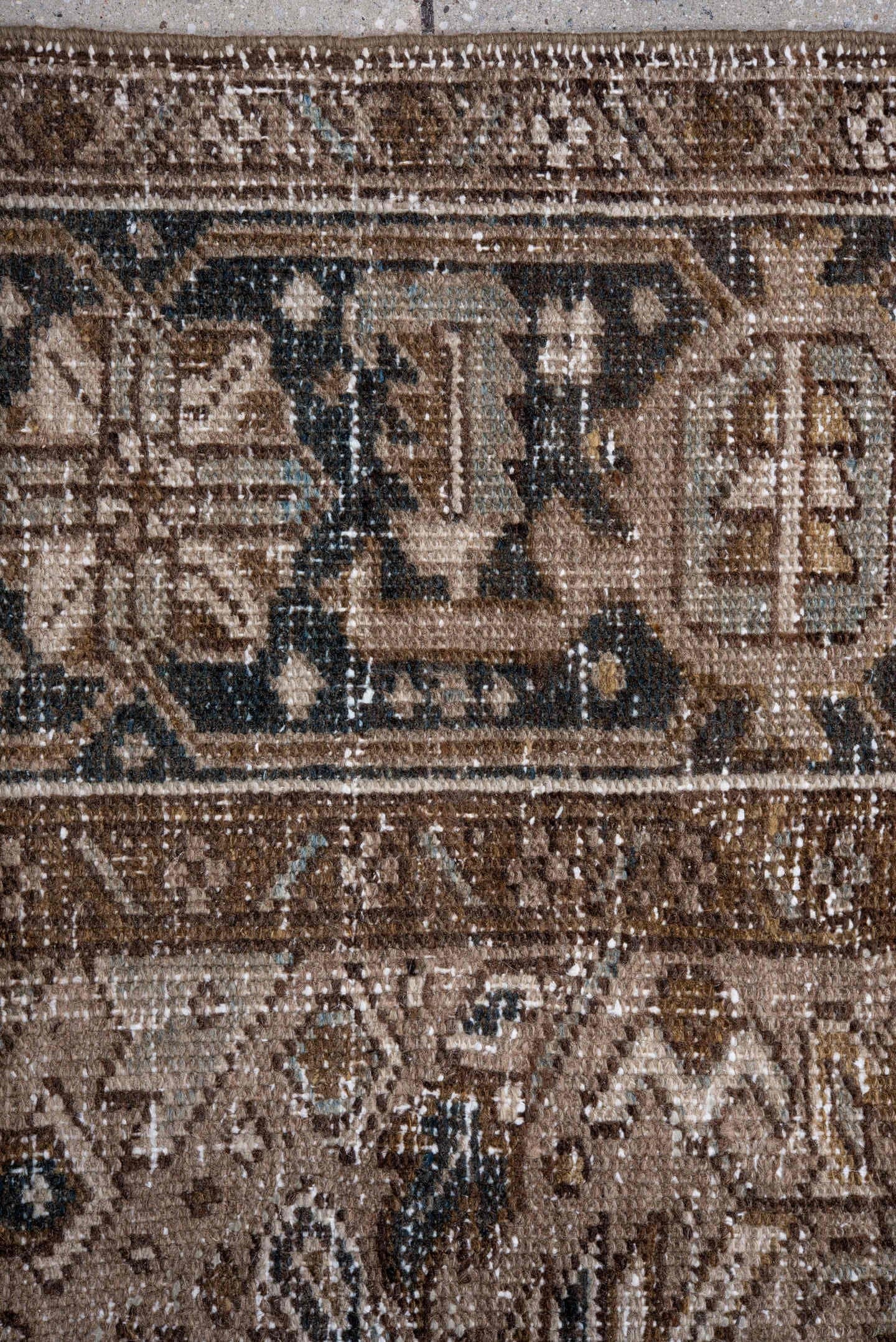 7' x 10' one-of-a-kind handmade antique Heriz large size rug. Color palette: taupe, brown, ivory, charcoal, beige, slate