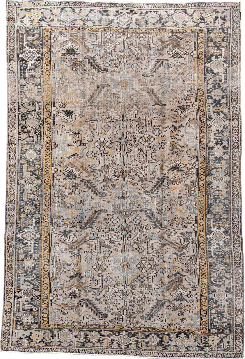 7' x 11' one-of-a-kind handmade antique Heriz large size rug. Color palette: taupe, ivory, charcoal, slate, gold, pale blue