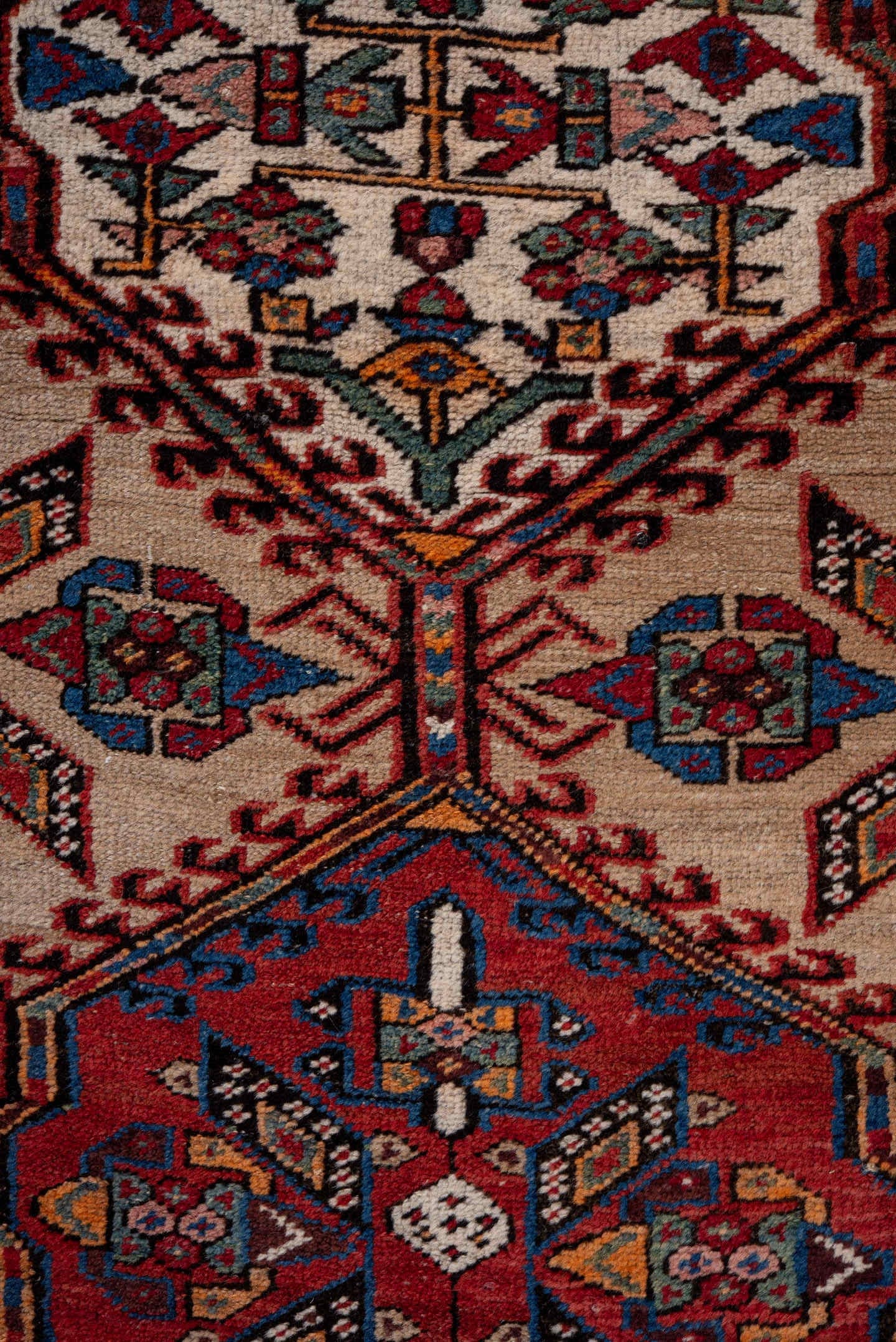 3' x 15' one-of-a-kind handmade antique Sarab runner rug. Color palette: ivory, rust, indigo, crimson, navy, camel, blue