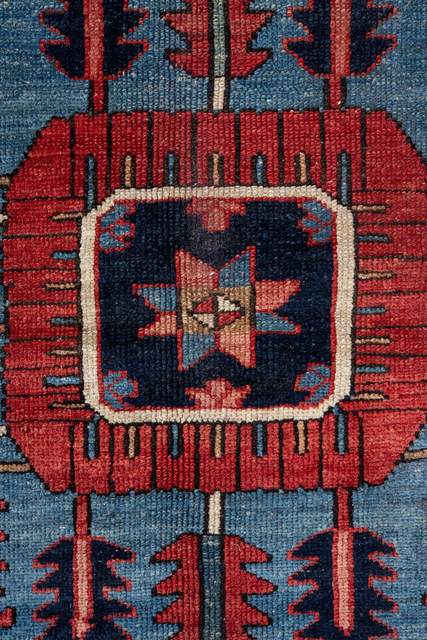 11' x 14' one-of-a-kind handmade vintage Serapi oversize rug. Color palette: brick red, navy, sky blue, ivory, coral, camel
