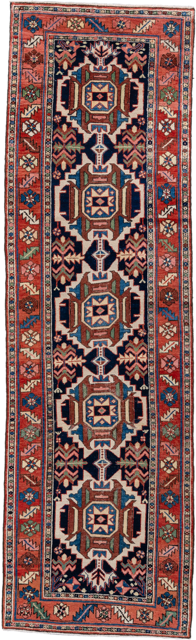 3' x 10' one-of-a-kind handmade antique Karaje runner rug. Color palette: navy, rust, ivory, sky blue, rose, sage, camel