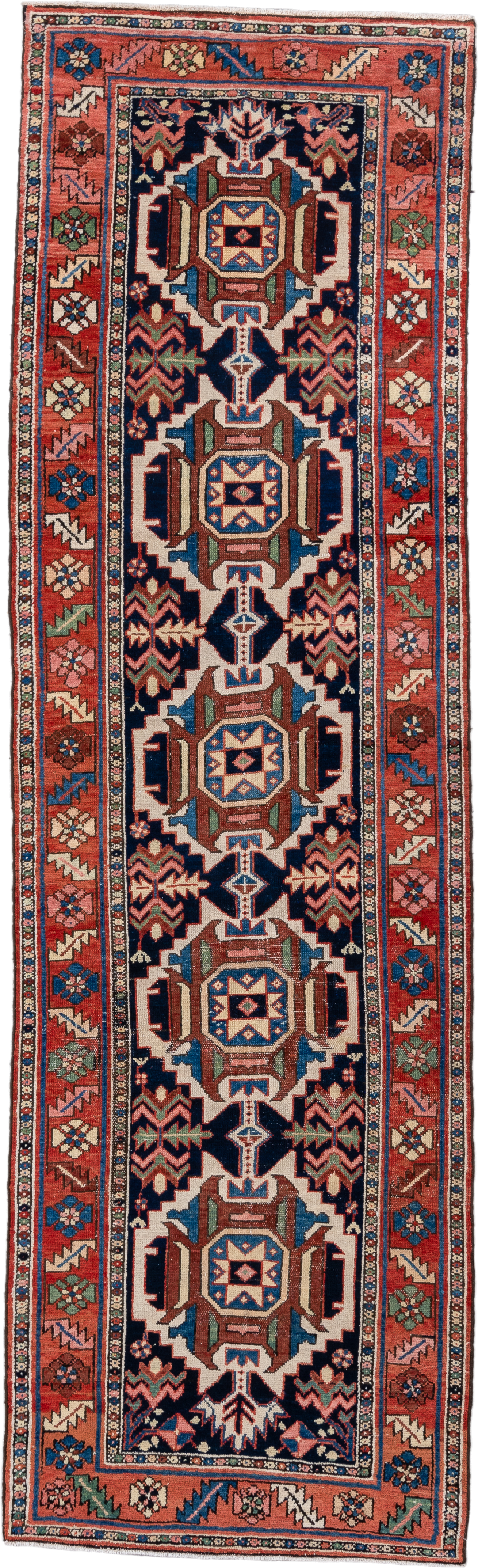 3' x 10' one-of-a-kind handmade antique Karaje runner rug. Color palette: navy, rust, ivory, sky blue, rose, sage, camel