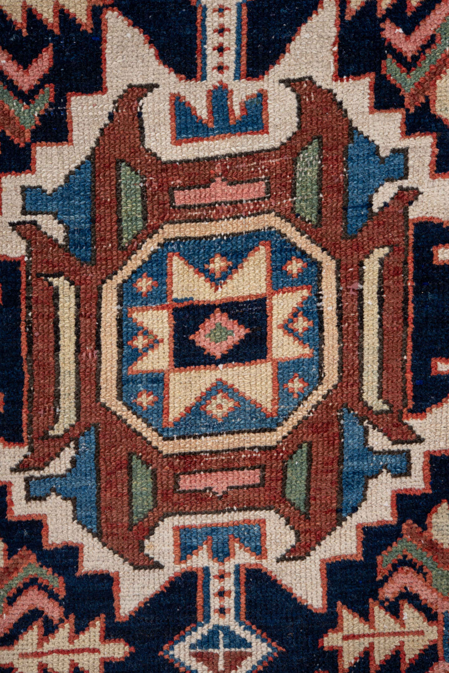 3' x 10' one-of-a-kind handmade antique Karaje runner rug. Color palette: navy, rust, ivory, sky blue, rose, sage, camel