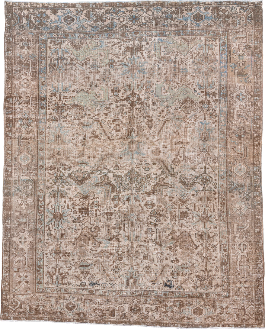 7' x 9' one-of-a-kind handmade antique Heriz rug. Color palette: taupe, brown, ivory, pale blue, beige, gray, light blue