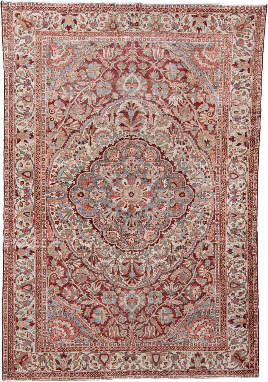 7' x 10' one-of-a-kind handmade vintage Baktiary large size rug. Color palette: ivory, rose, light blue, rust, burgundy